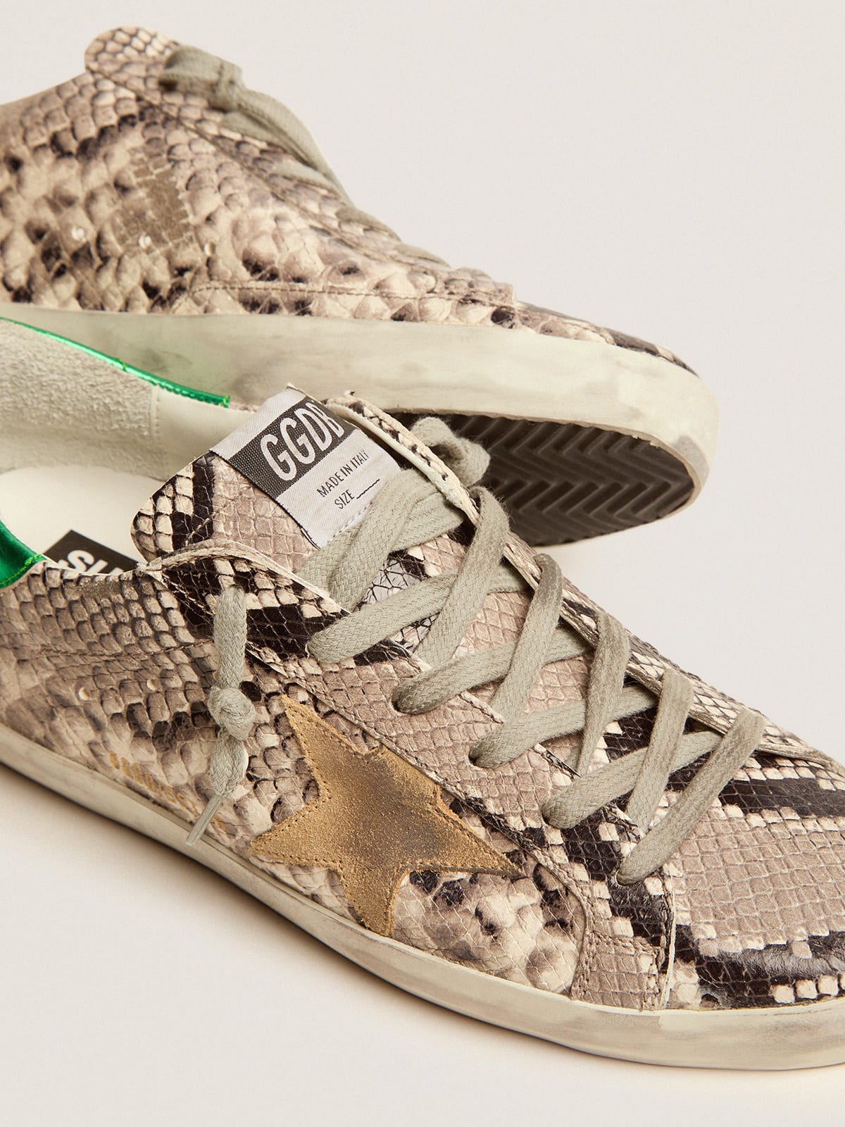 Super-Star LTD sneakers with snake-print leather upper and green laminated  leather heel tab | Golden Goose