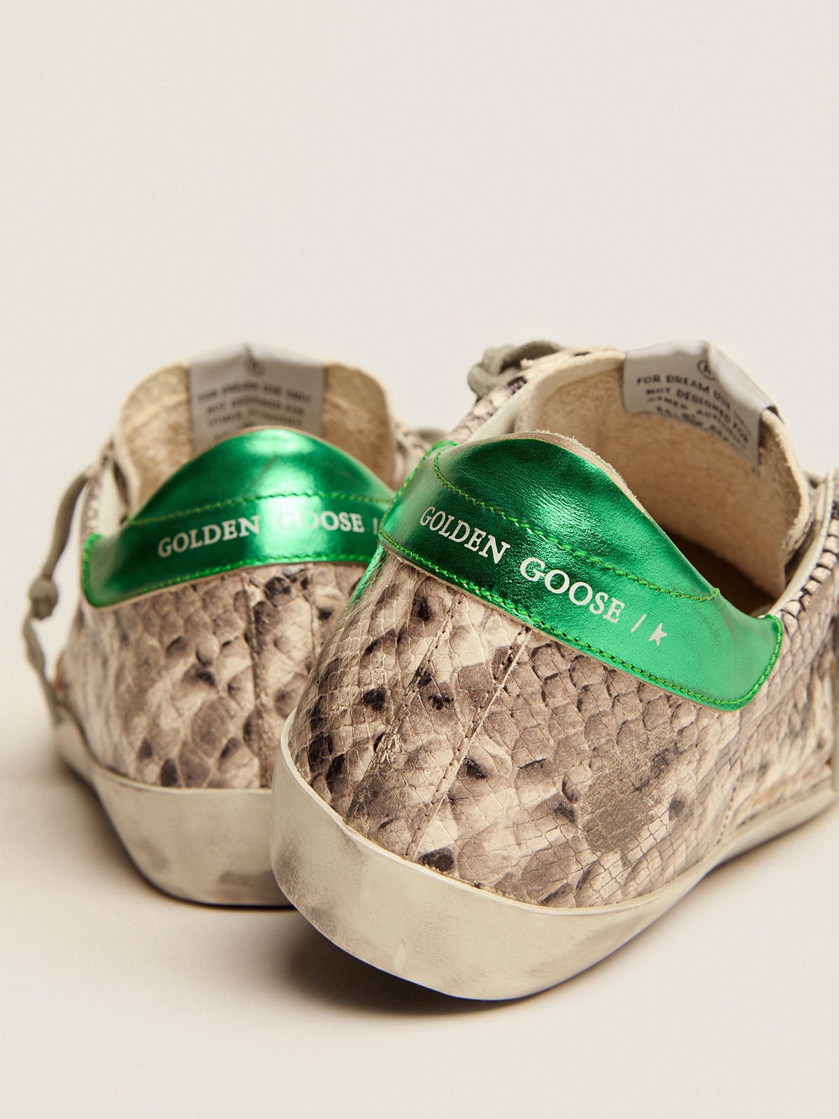 Super-Star LTD sneakers with snake-print leather upper and green laminated  leather heel tab | Golden Goose