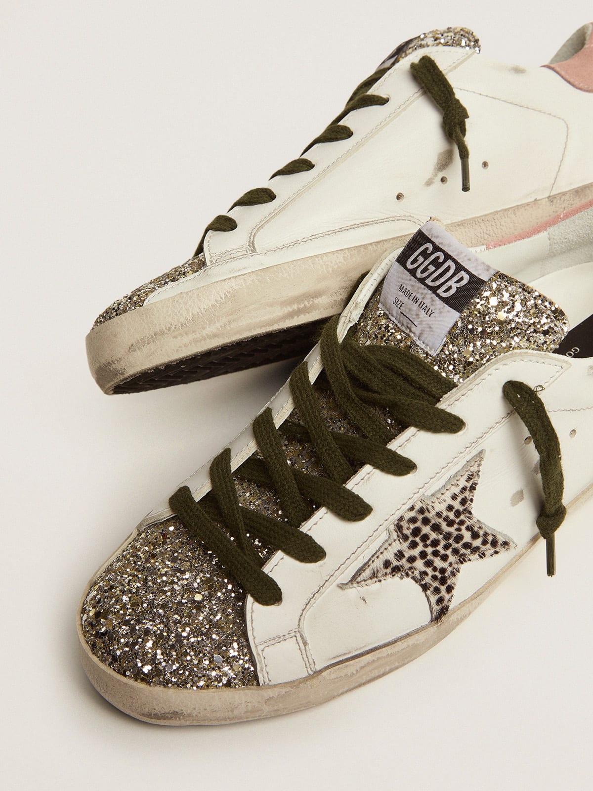 Super-Star LTD sneakers with silver glitter and animal-print pony skin star  | Golden Goose