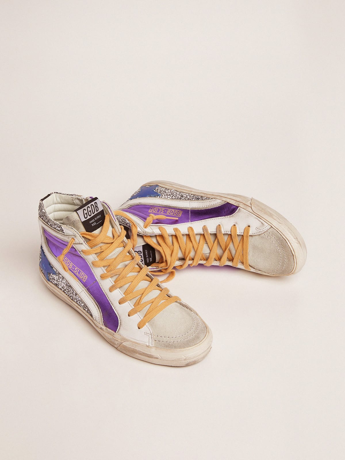 Slide sneakers with silver glitter and purple laminated leather