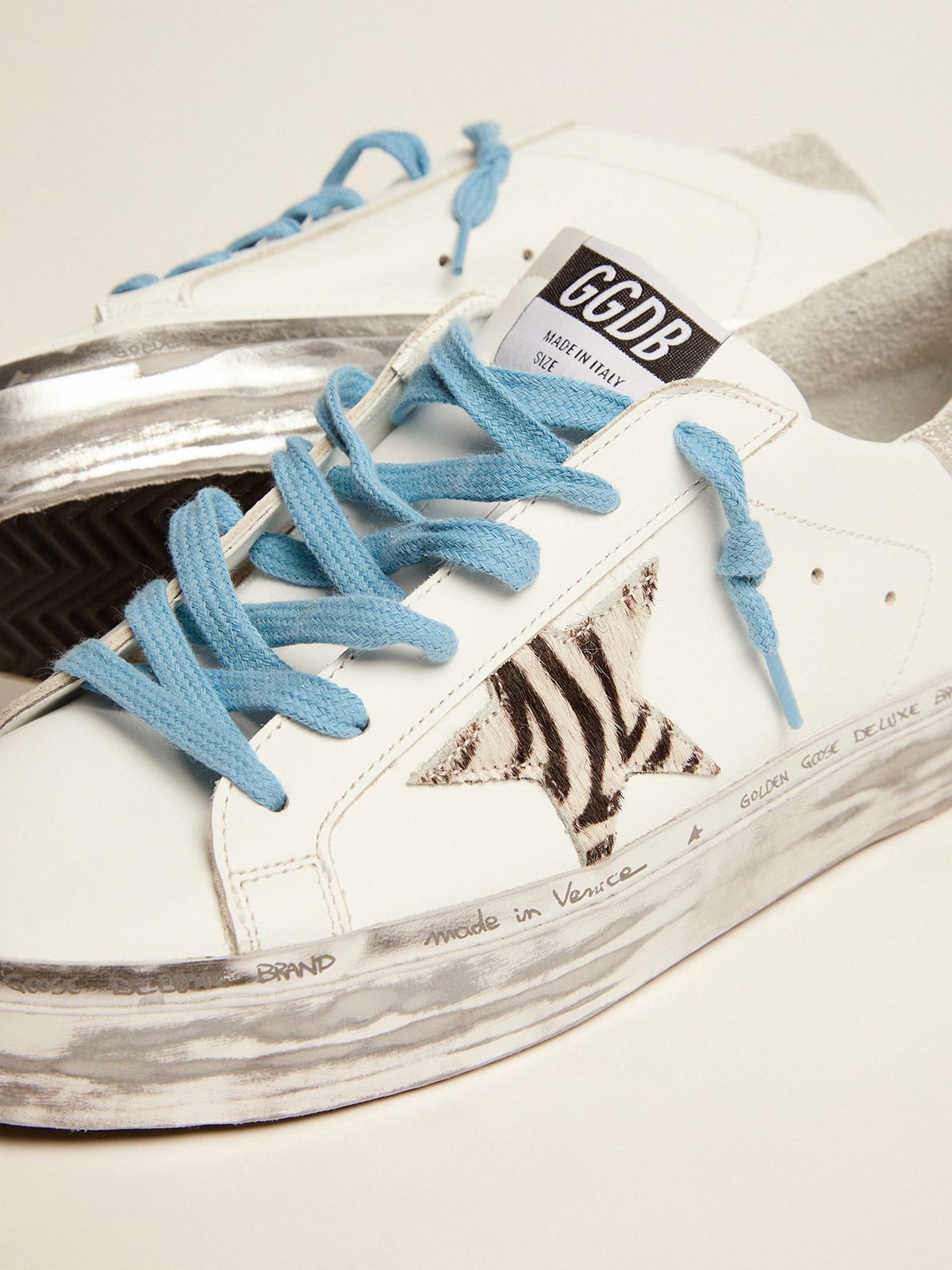 Golden Goose - Hi Star sneakers with zebra-print pony skin star and glitter heel tab in 