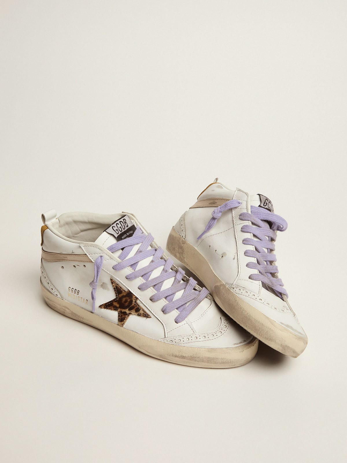 Golden Goose - Mid Star sneakers with pony skin star and orange heel tab   in 