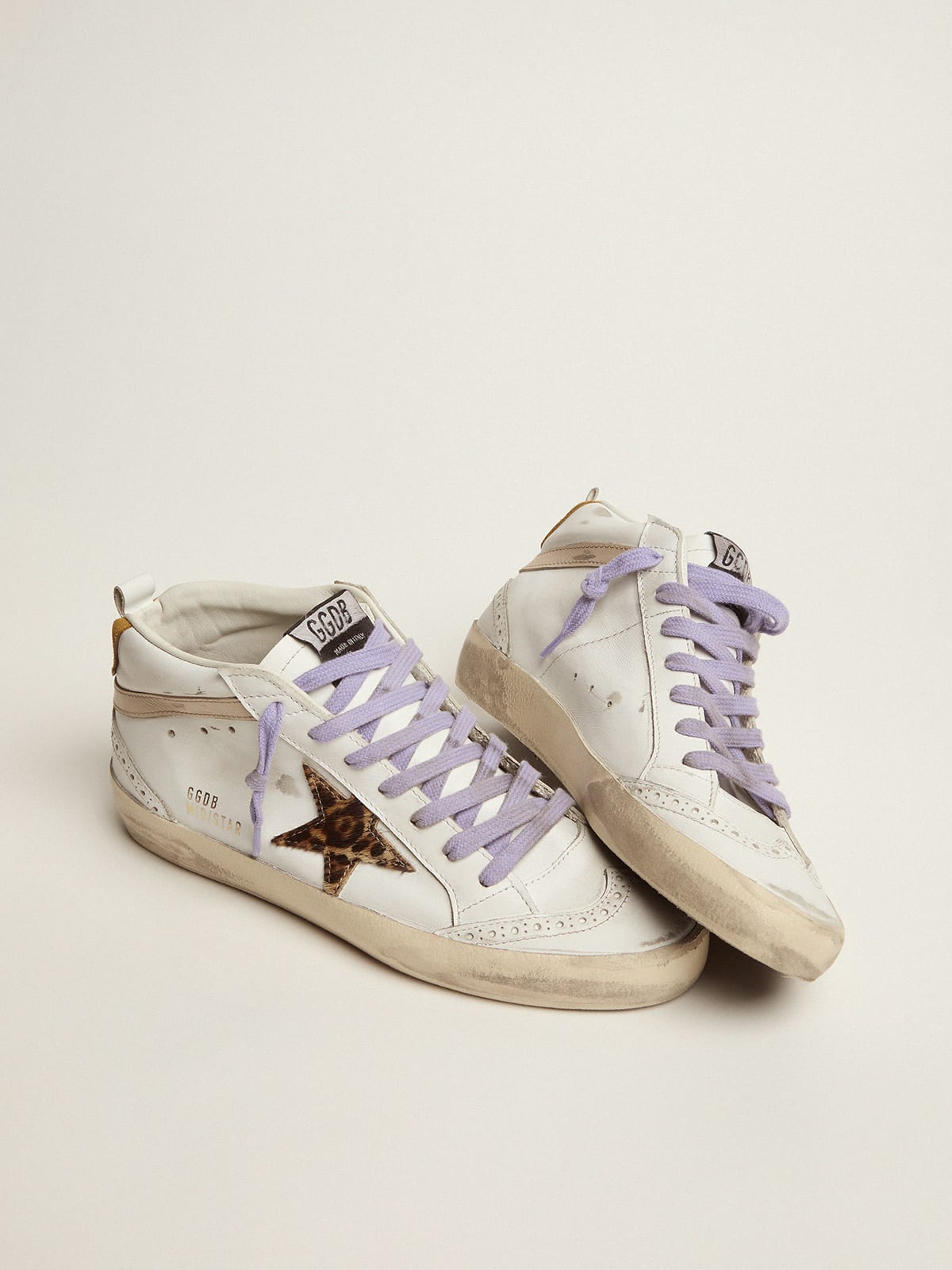 Mid Star sneakers with pony skin star and orange heel tab | Golden Goose