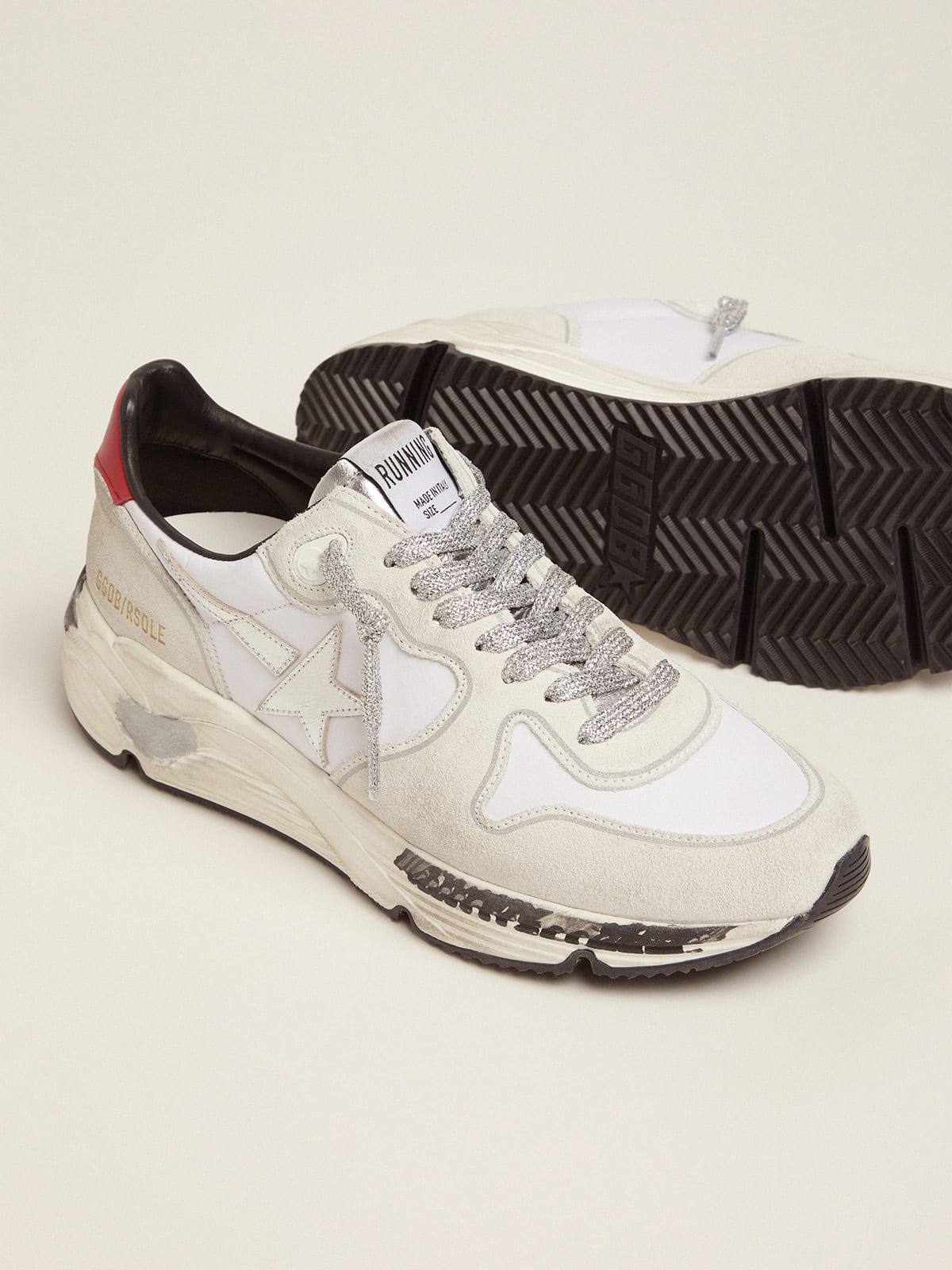 Running Sole sneakers with red heel tab and silver star | Golden Goose