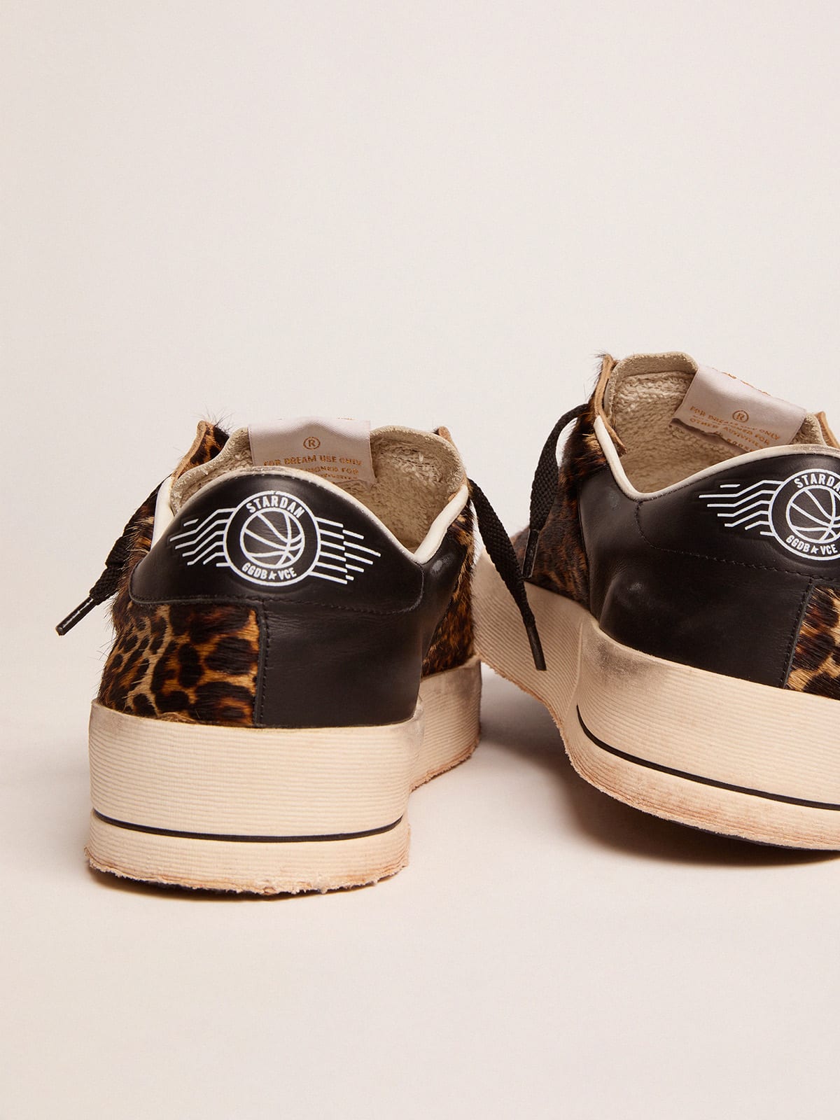 Golden Goose - Zapatillas deportivas Stardan de piel efecto potro con motivo leopardo y estrella negra in 