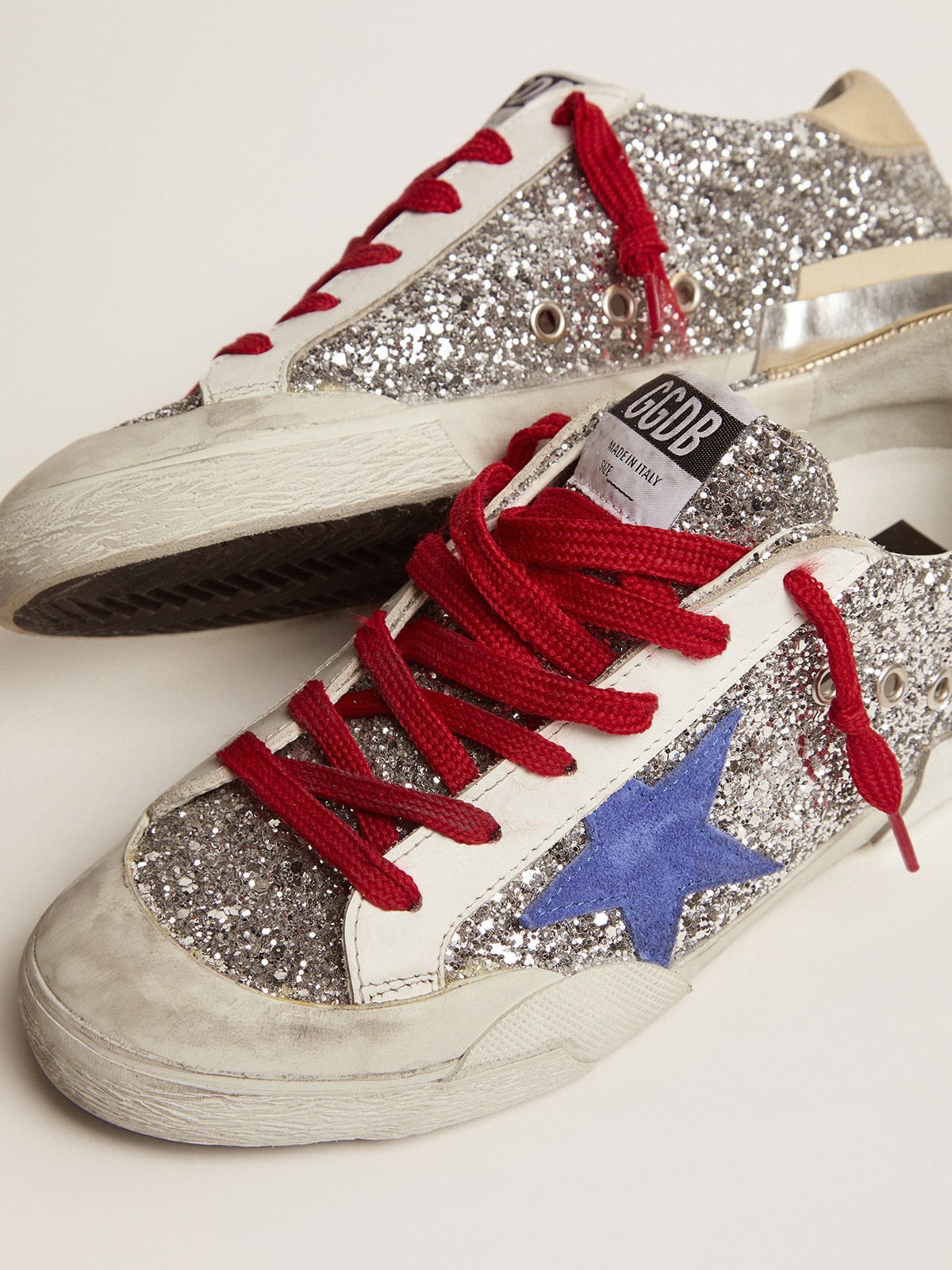 Red and store blue golden goose