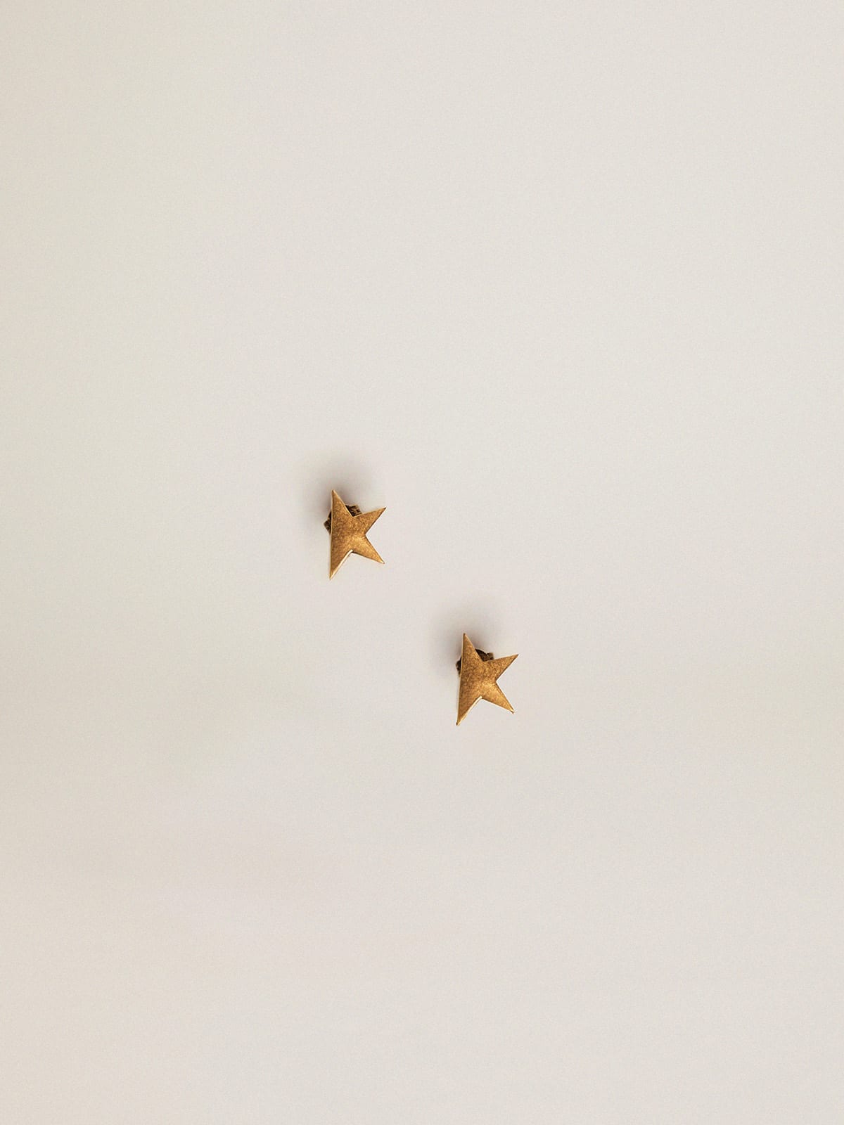 Golden Goose - Women's stud earrings in old gold color in 