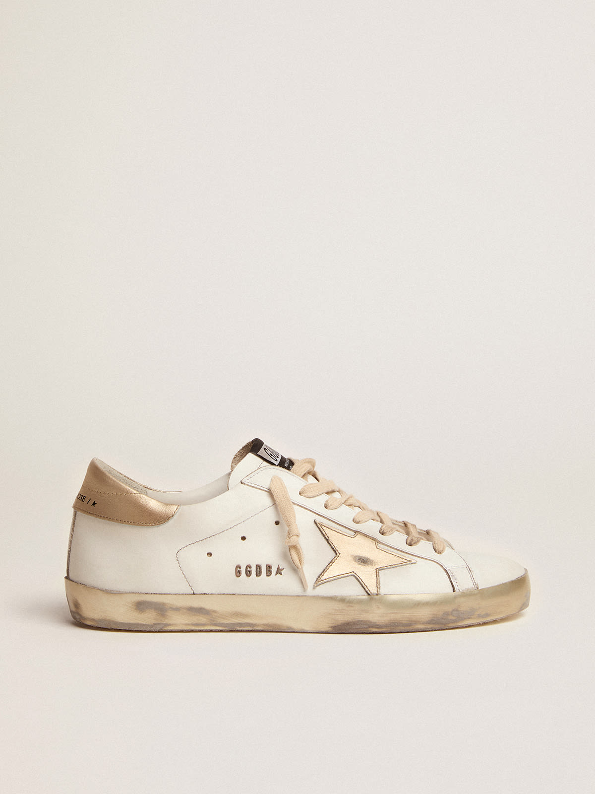 Golden Goose - Super-Star masculino com reforço dourado brilhante e inscrições in 