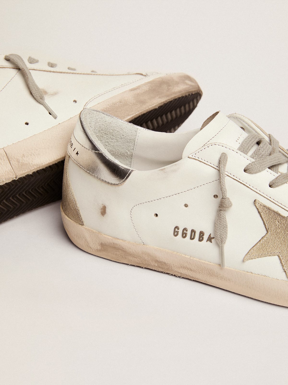 Golden Goose - Men’s Super-Star sneakers with silver heel tab and metal stud lettering in 