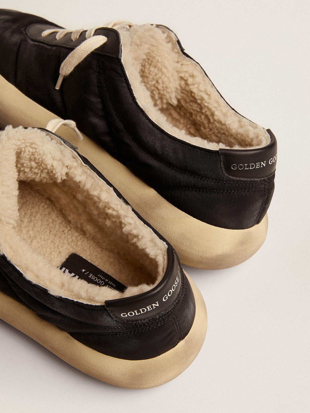 Golden Goose - Space-Star Uomo in nylon nero trapuntato e fodera in shearling in 