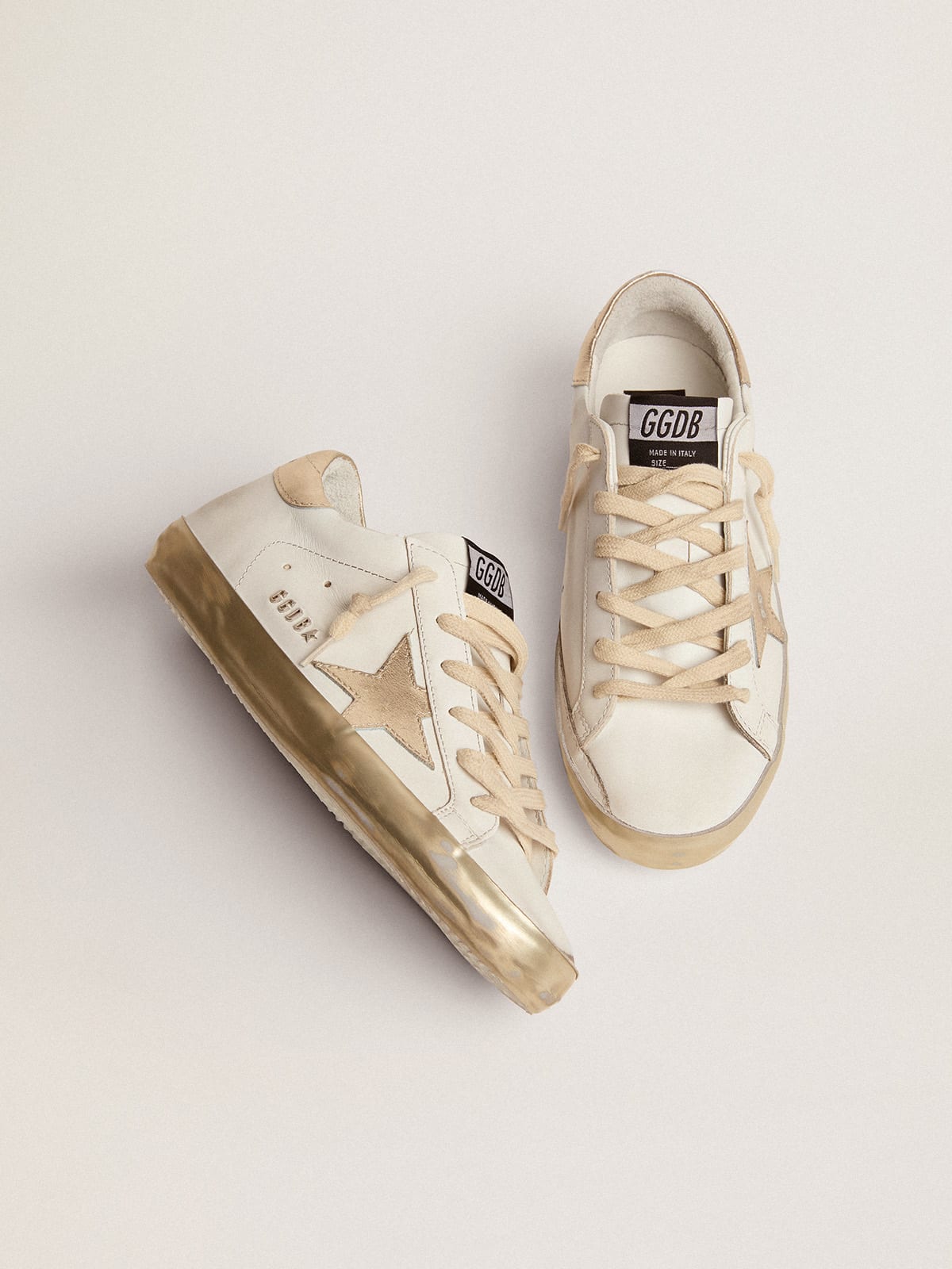 Golden Goose - Women's Super-Star with gold sparkle foxing and metal stud lettering in 