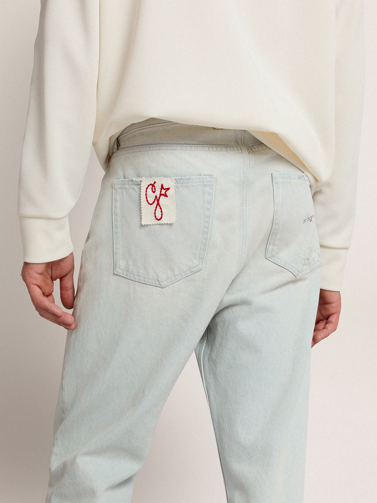 Golden Goose - Men's bleached jeans with distressed treatment in 