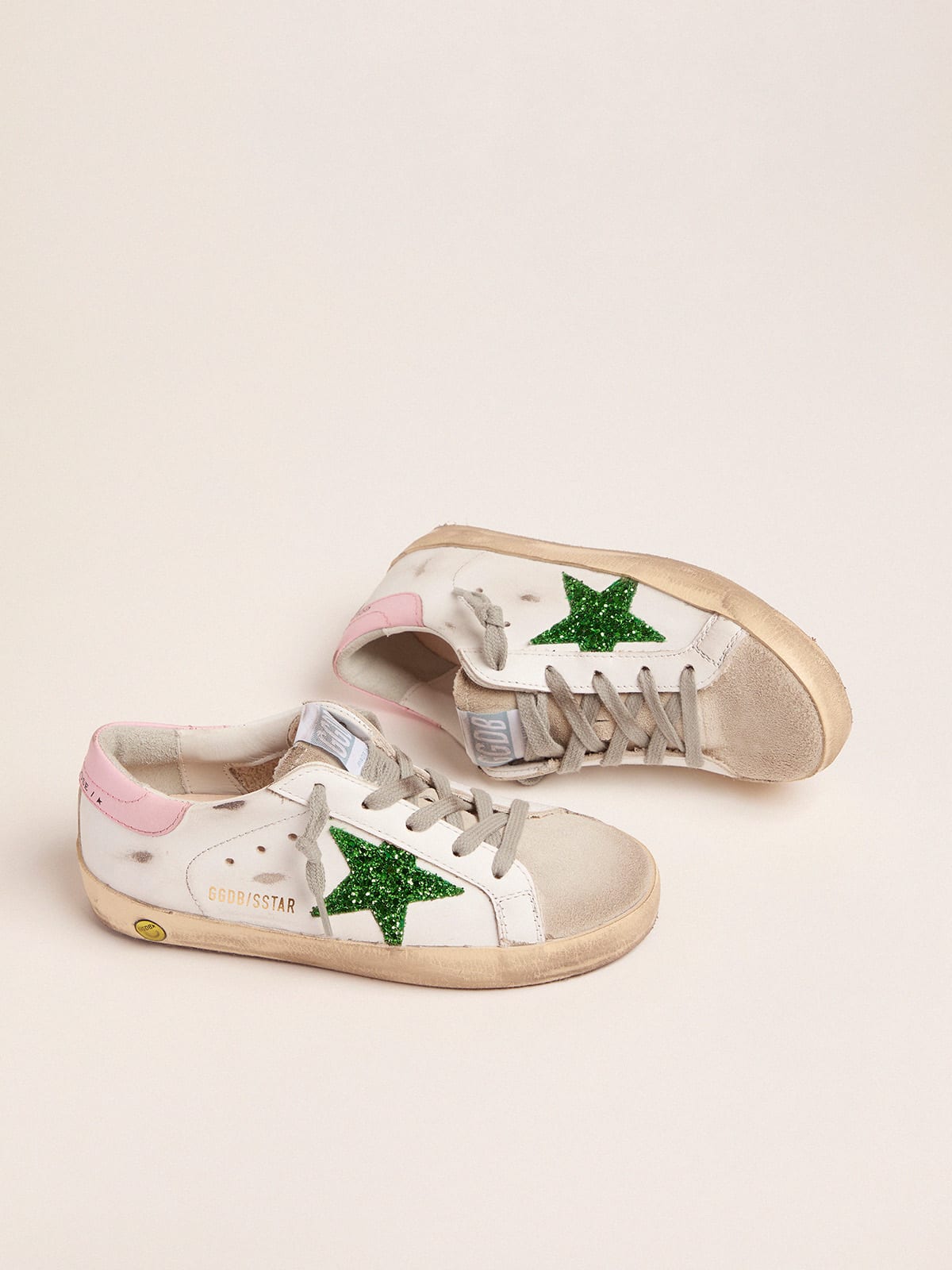 Sneakers Super Star young avec toile paillettes vertes et contrefort rose