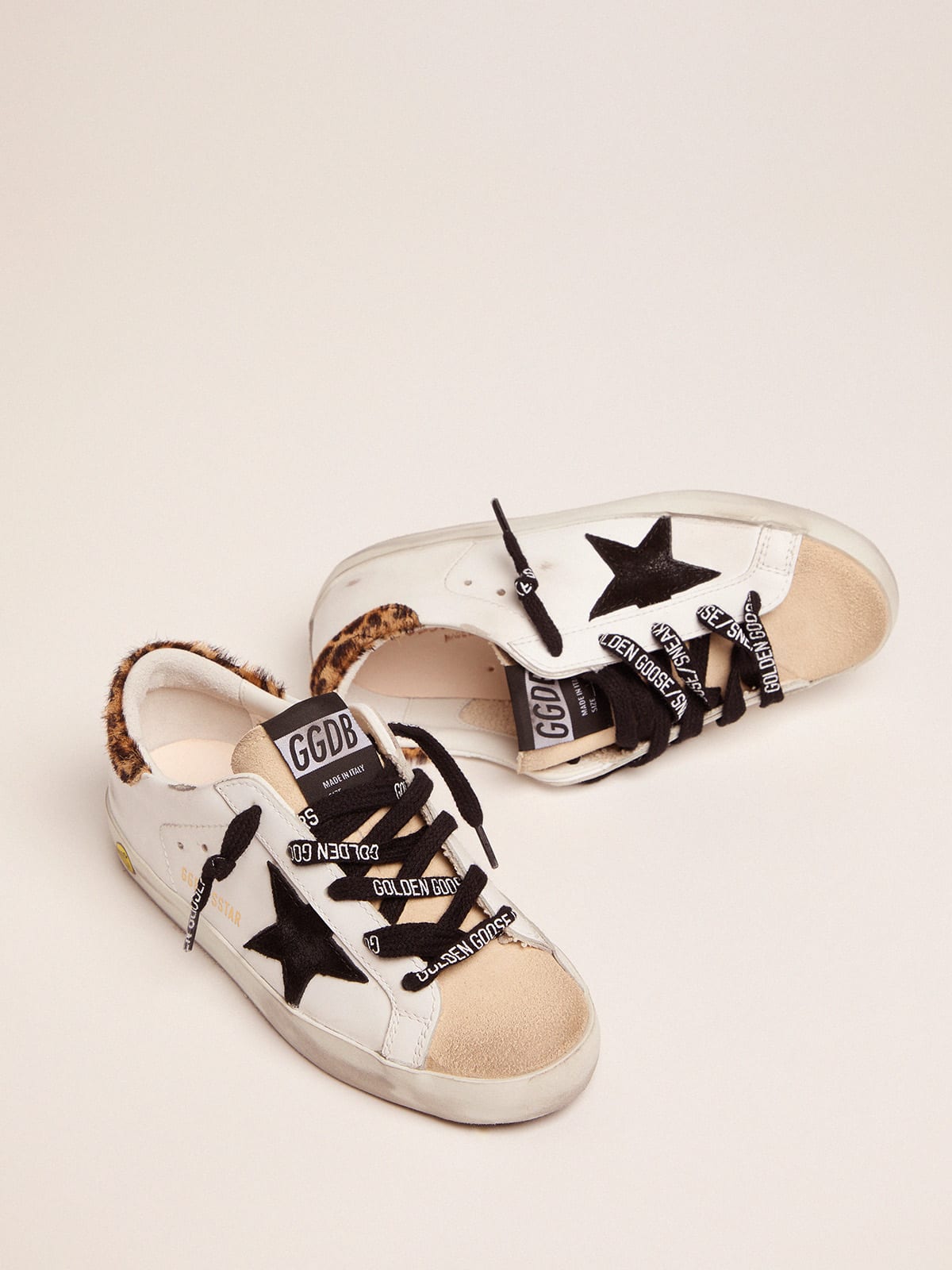 Golden Goose - Young Super-Star sneakers with leopard-print pony skin heel tab and black star in 