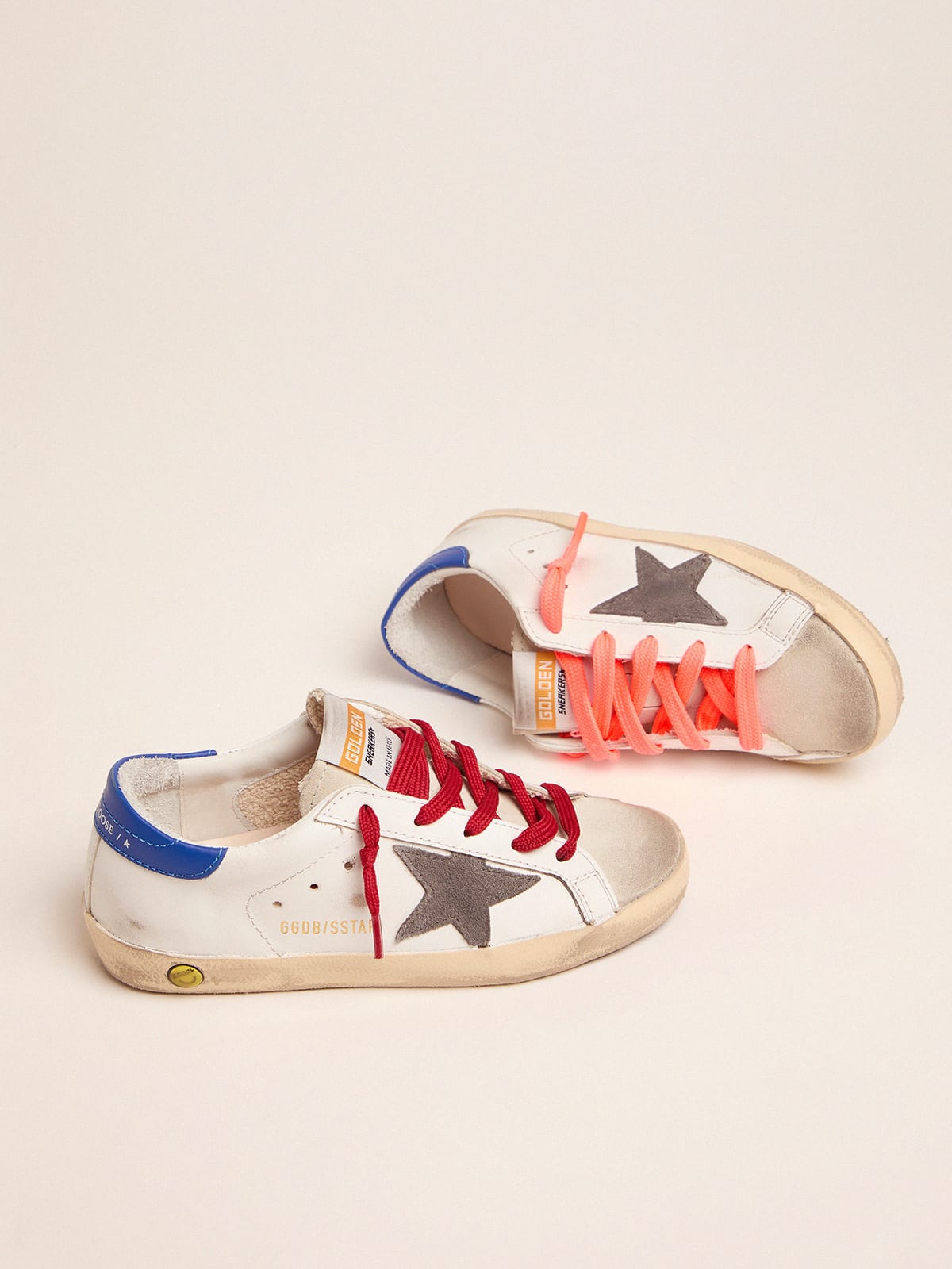 Red white and store blue golden goose