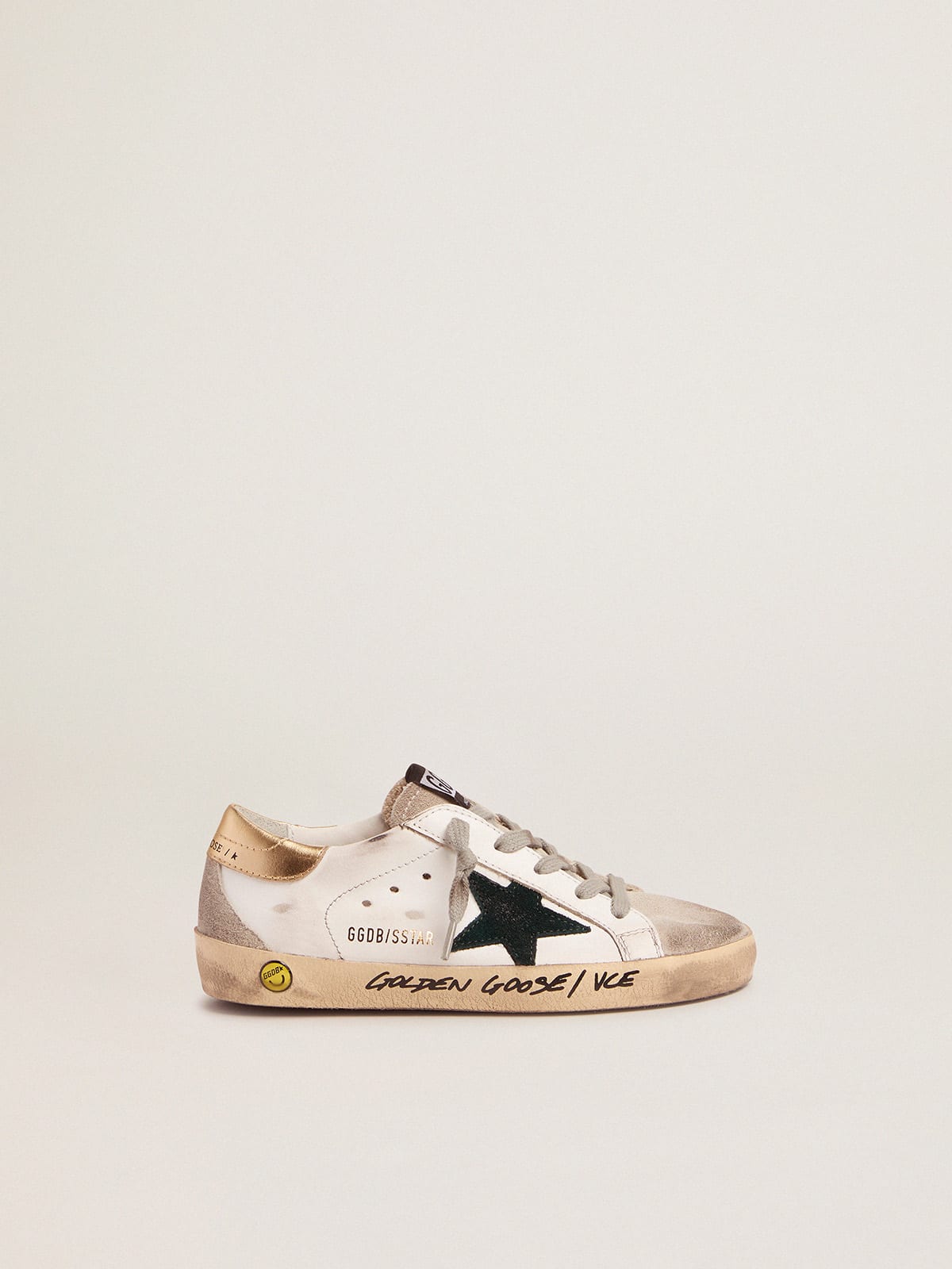 Young Super-Star sneakers with gold heel tab and handwritten lettering |  Golden Goose