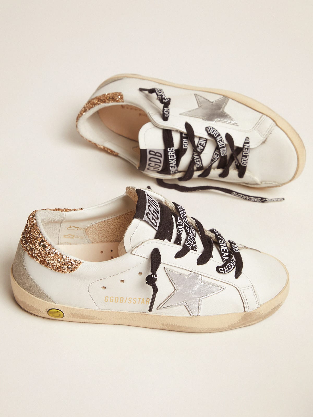 Young white leather Super-Star sneakers with glittery heel tab