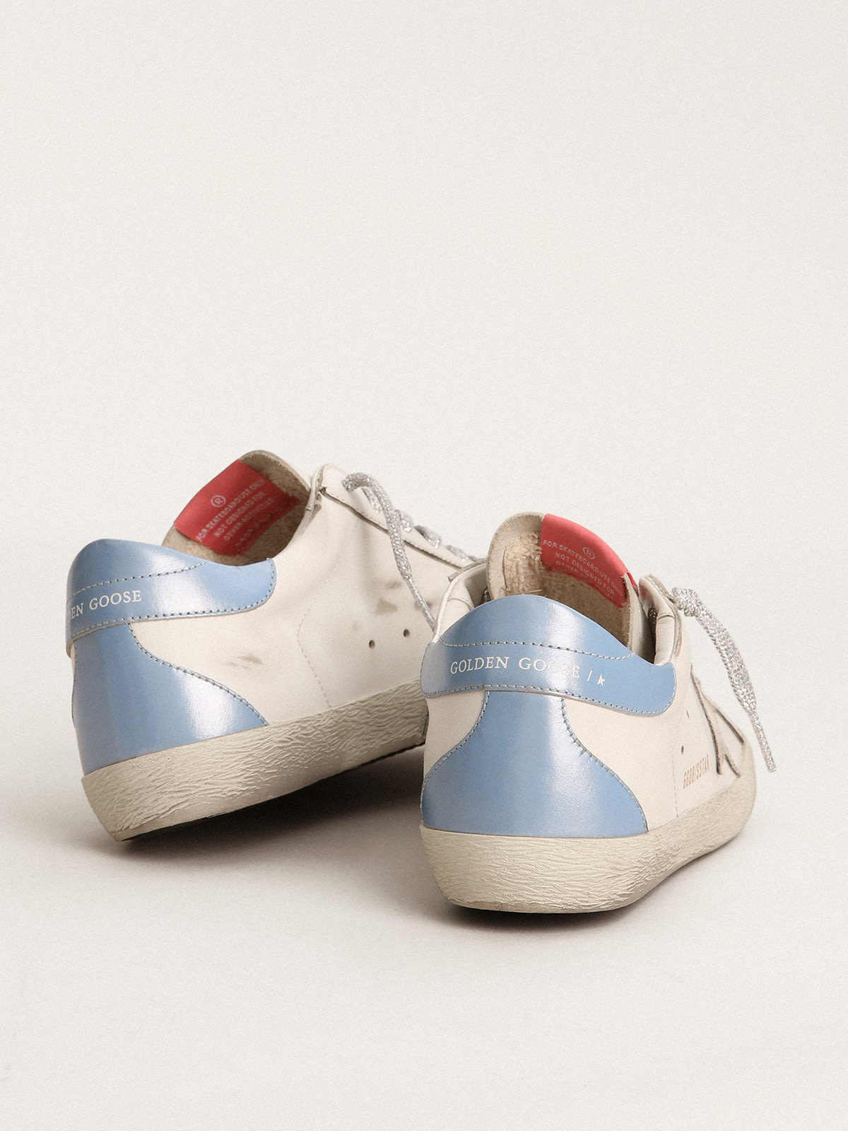 Super-Star sneakers with sky-blue laminated leather heel tab and 