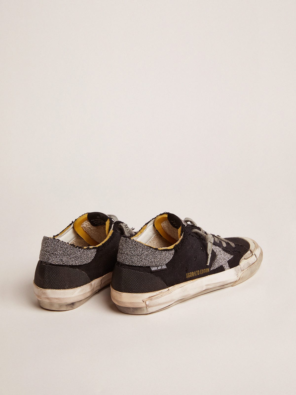 Golden Goose - Super-Star Penstar LAB sneakers in black distressed canvas with crystal star and heel tab     in 