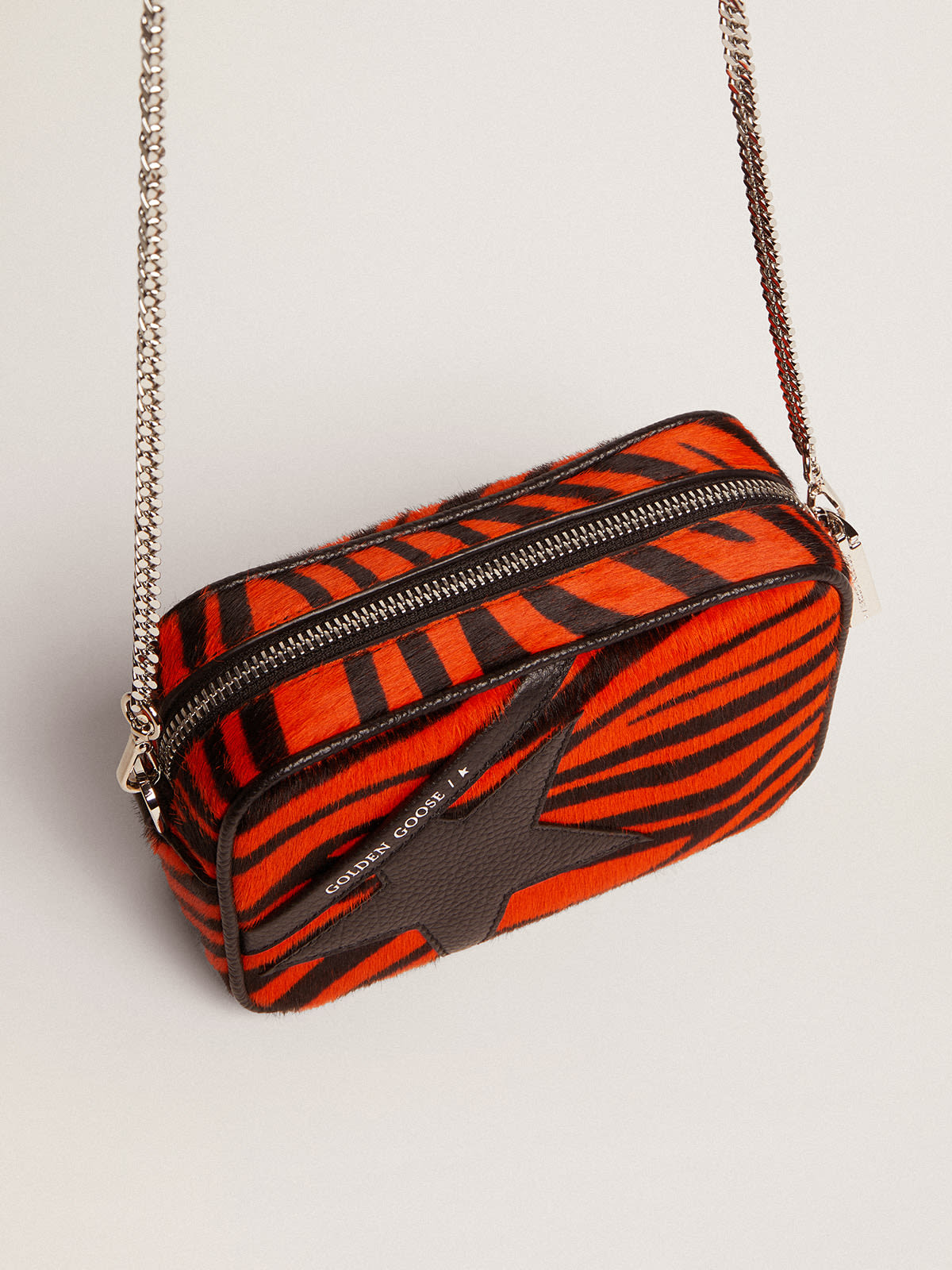 Women's Mini Star Bag in orange tiger print pony skin with black