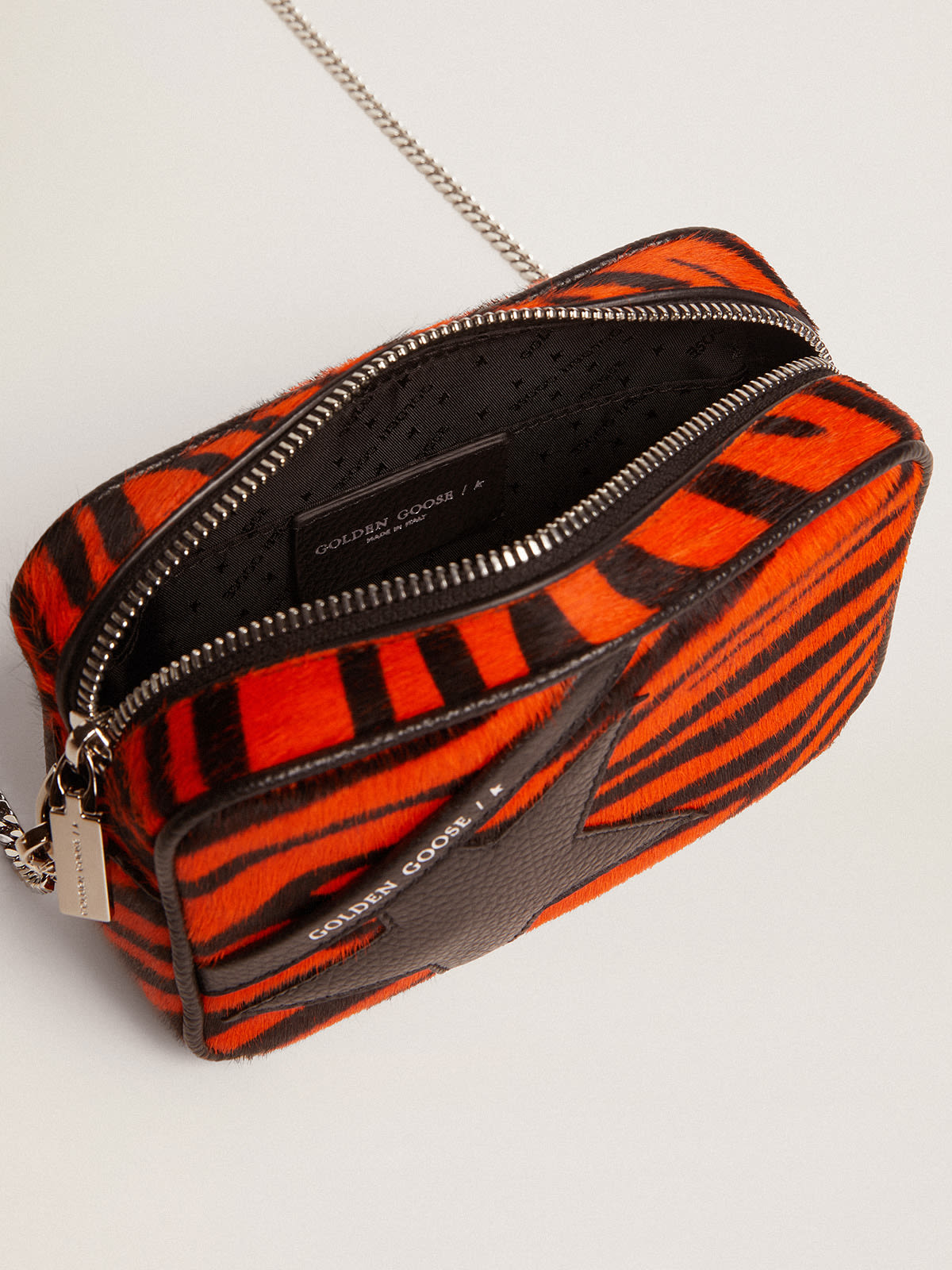 Golden Goose - Mini Star Bag de piel de potro con estampado de tigre naranja y estrella negra in 