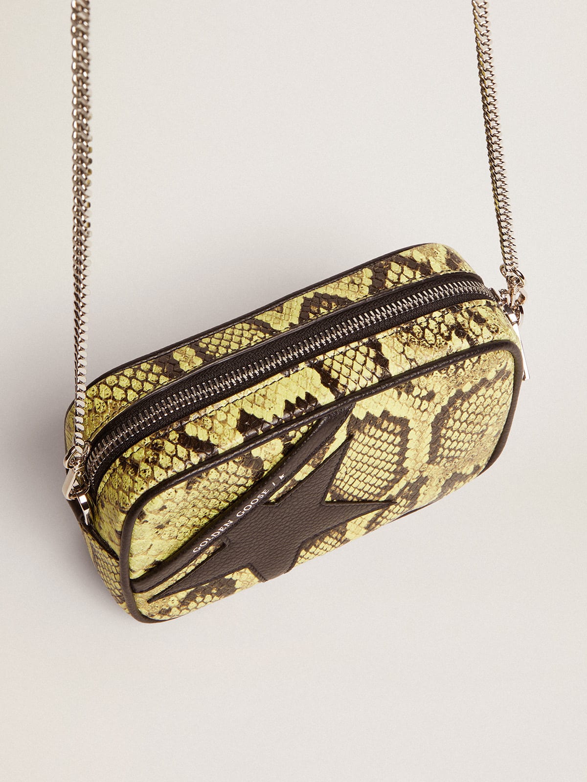 Women's Mini Star Bag in lime green snake print leather with black star