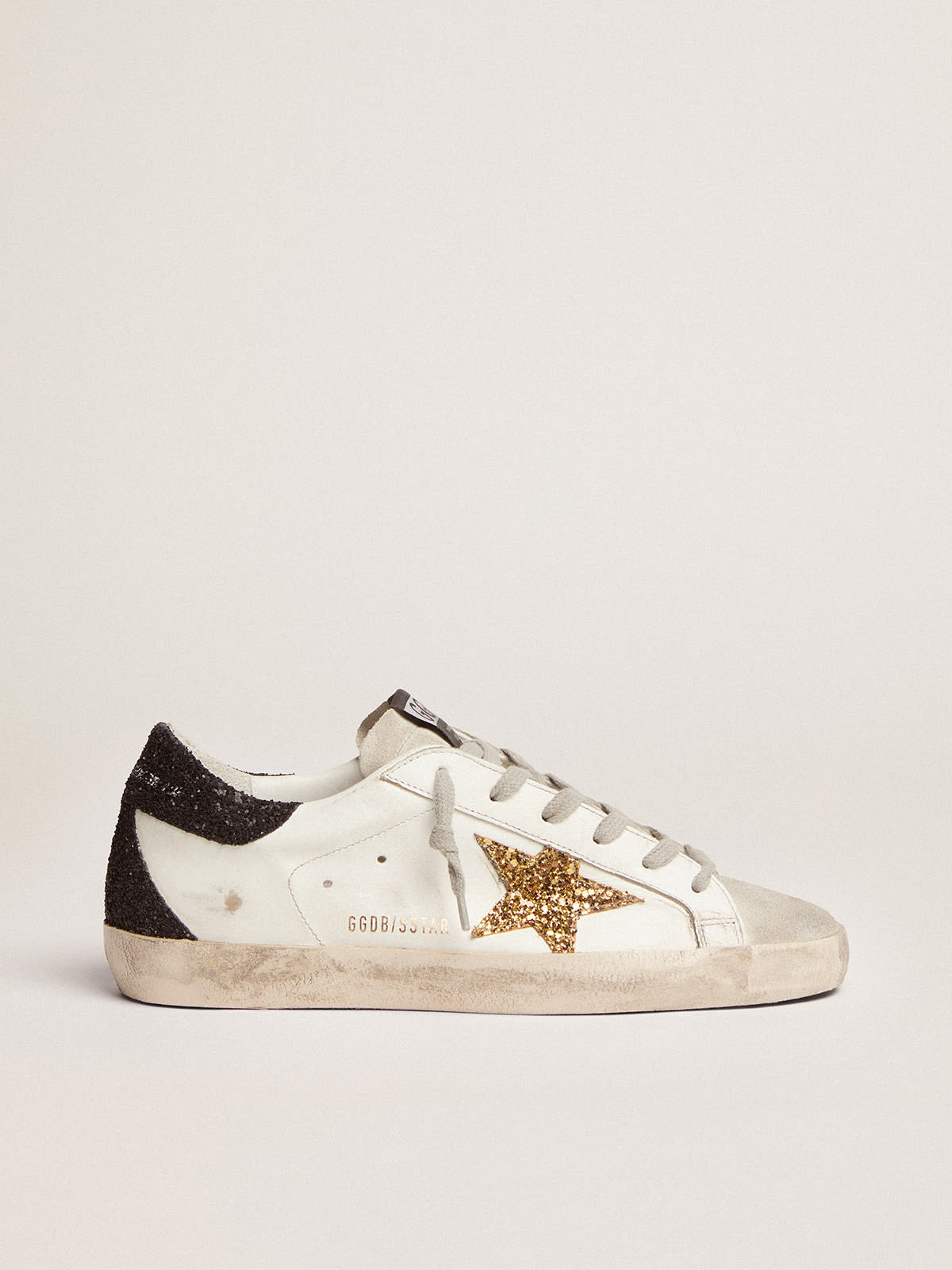 Super-Star sneakers with gold star and glittery black heel tab
