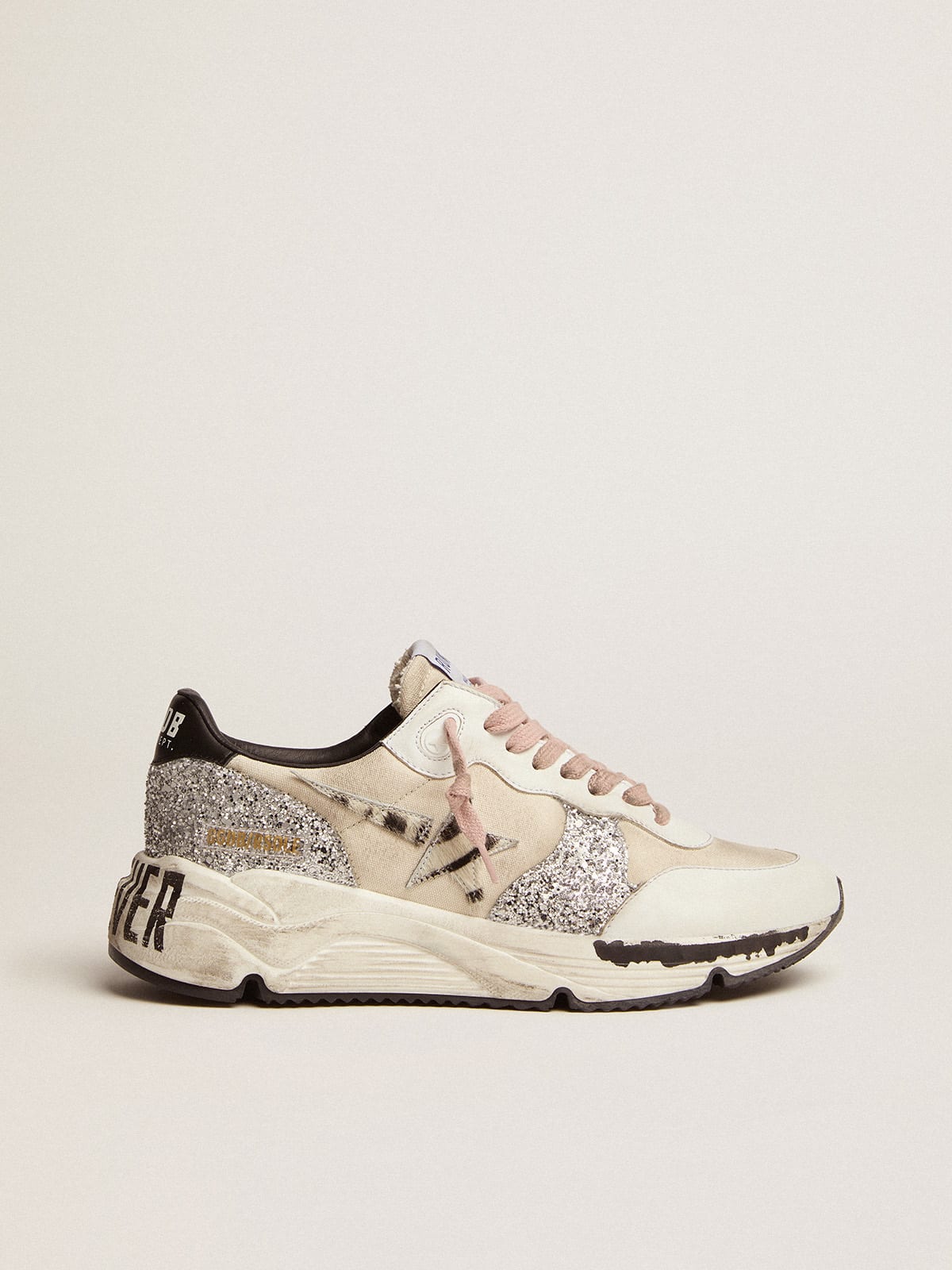 Women s Running Sole cream colored upper and zebra print pony skin star