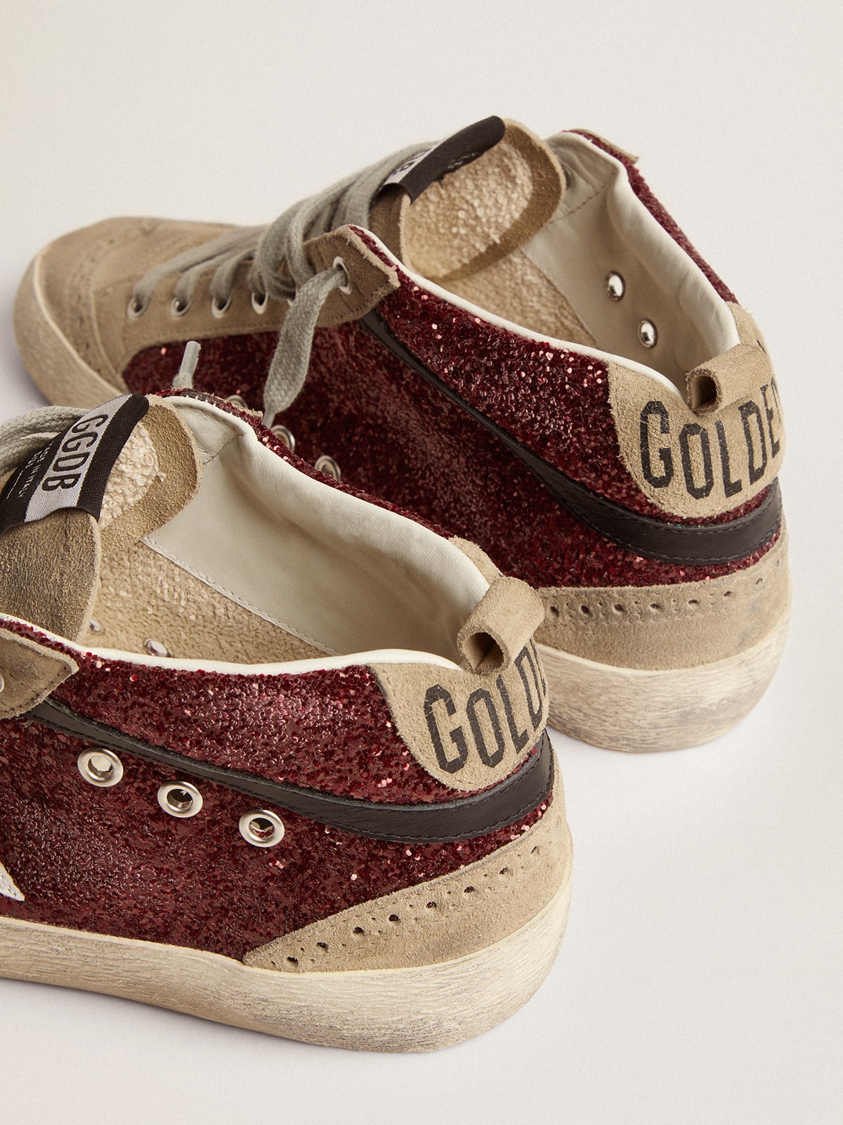 Maroon and gold store sneakers