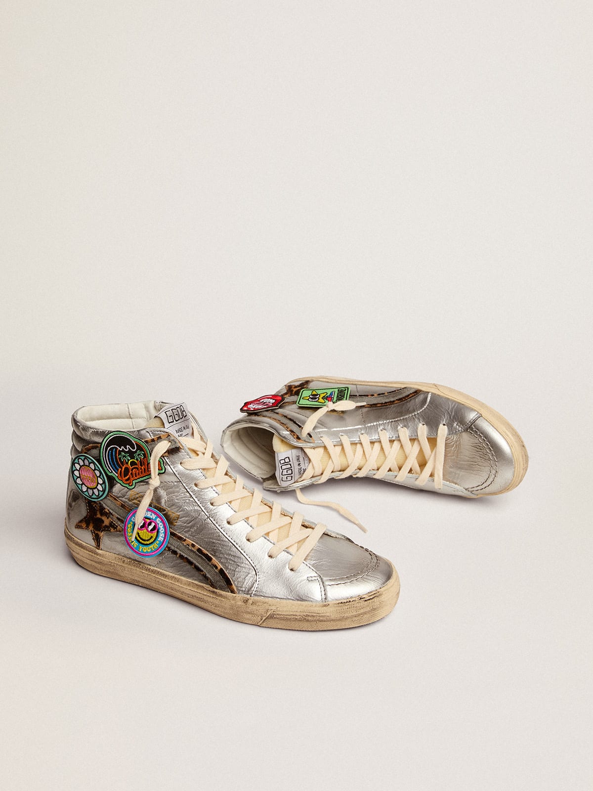 Golden Goose - Slide sneakers in silver laminated leather with leopard-print pony skin star and flash with detachable multicolored patches in 