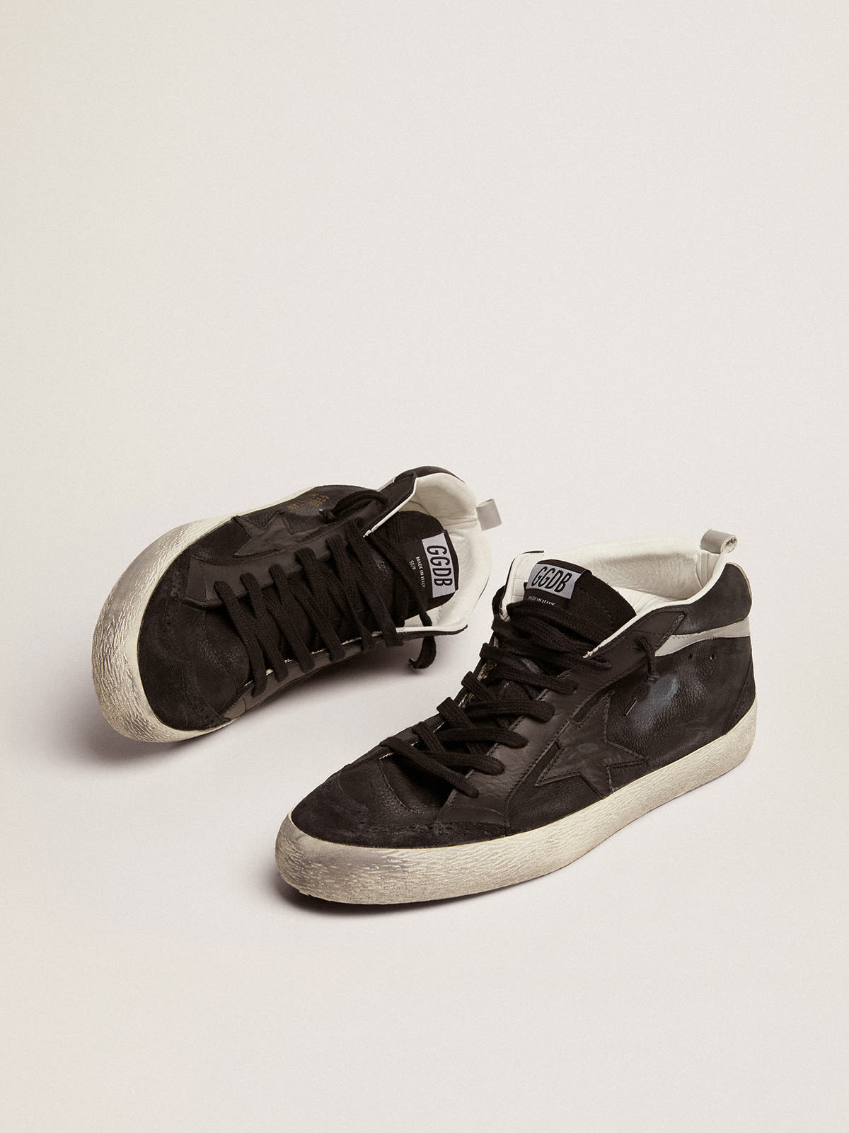 Golden Goose - Mid Star sneakers in black nubuck with black leather star and silver laminated leather flash in 