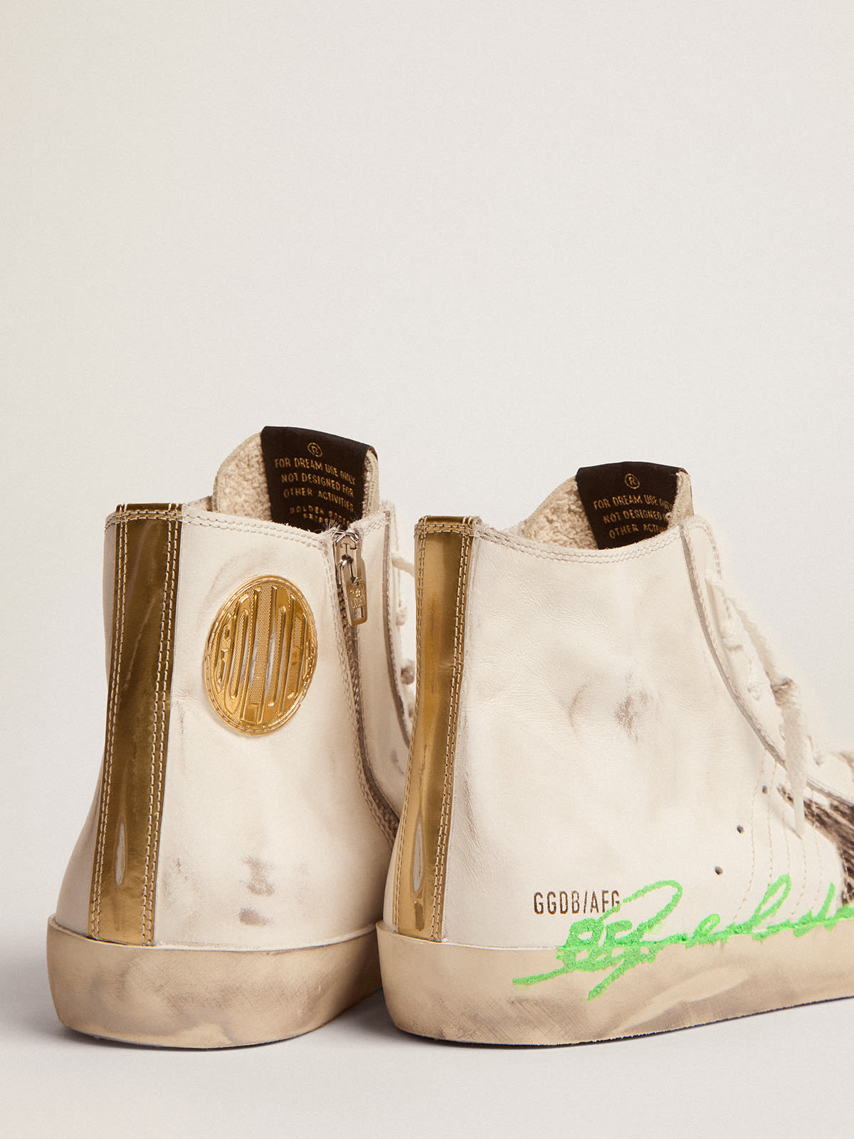 Golden Goose - Sneakers Francy Penstar LTD en cuir blanc avec étoile en cuir façon poulain zébré et logo à paillettes vertes in 