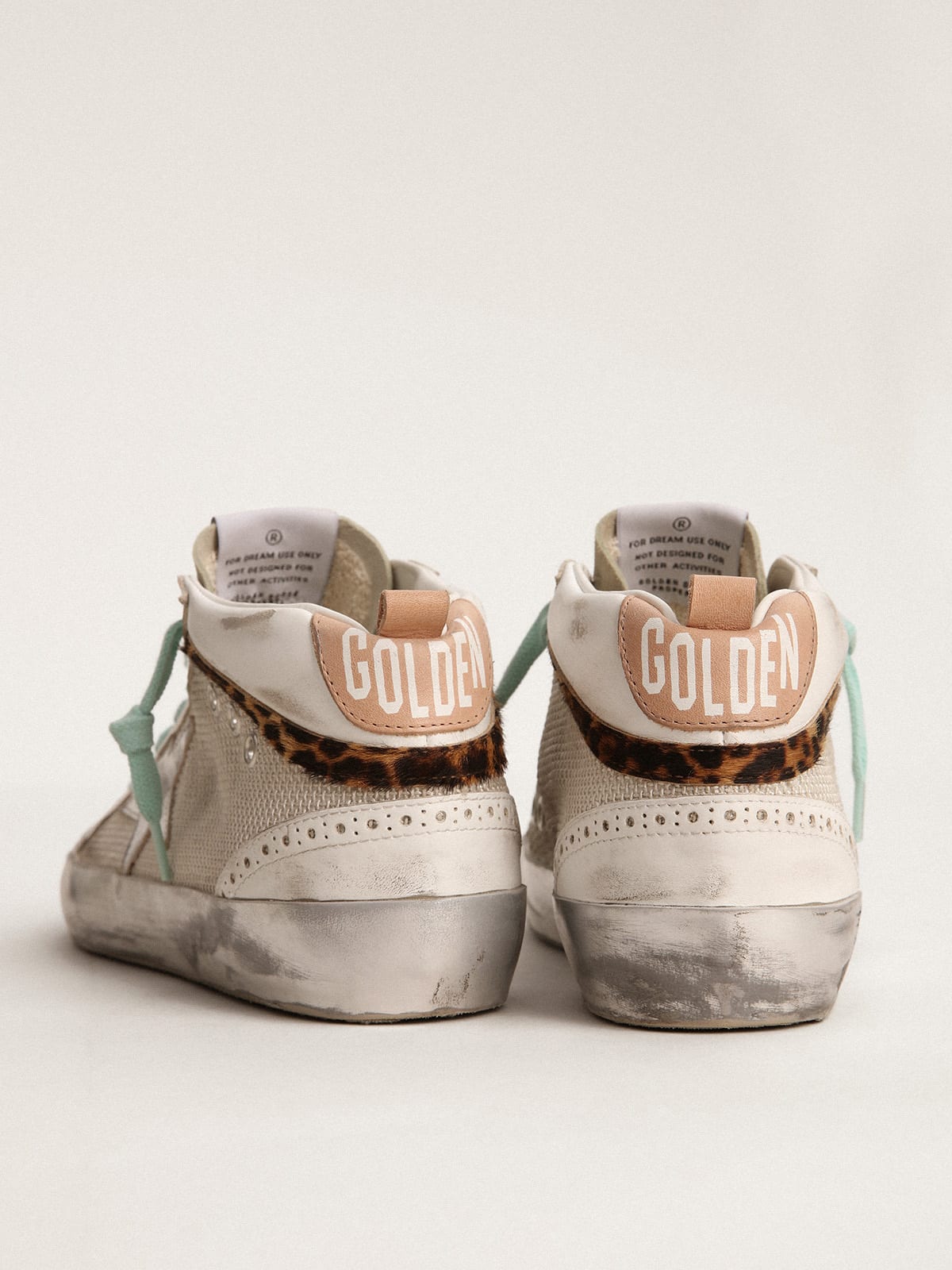 Golden Goose - Zapatillas deportivas Mid Star con estrella de piel laminada color plateado y detalle de «coma» de piel efecto potro con estampado leopardo in 