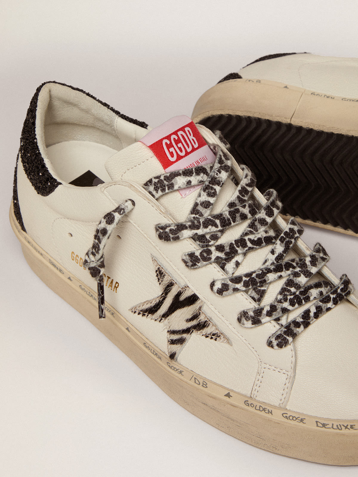 Golden Goose - Women's Hi Star with zebra print pony skin star and glitter heel tab in 