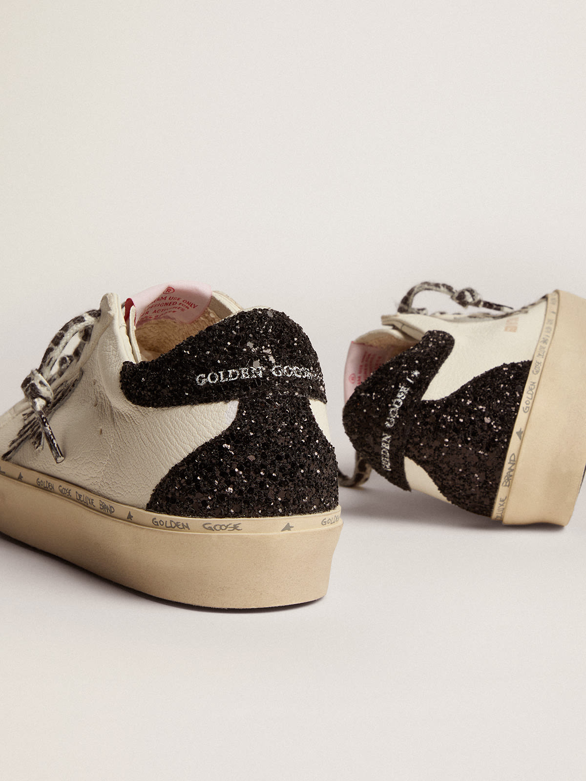 Golden Goose - Women's Hi Star with zebra print pony skin star and glitter heel tab in 