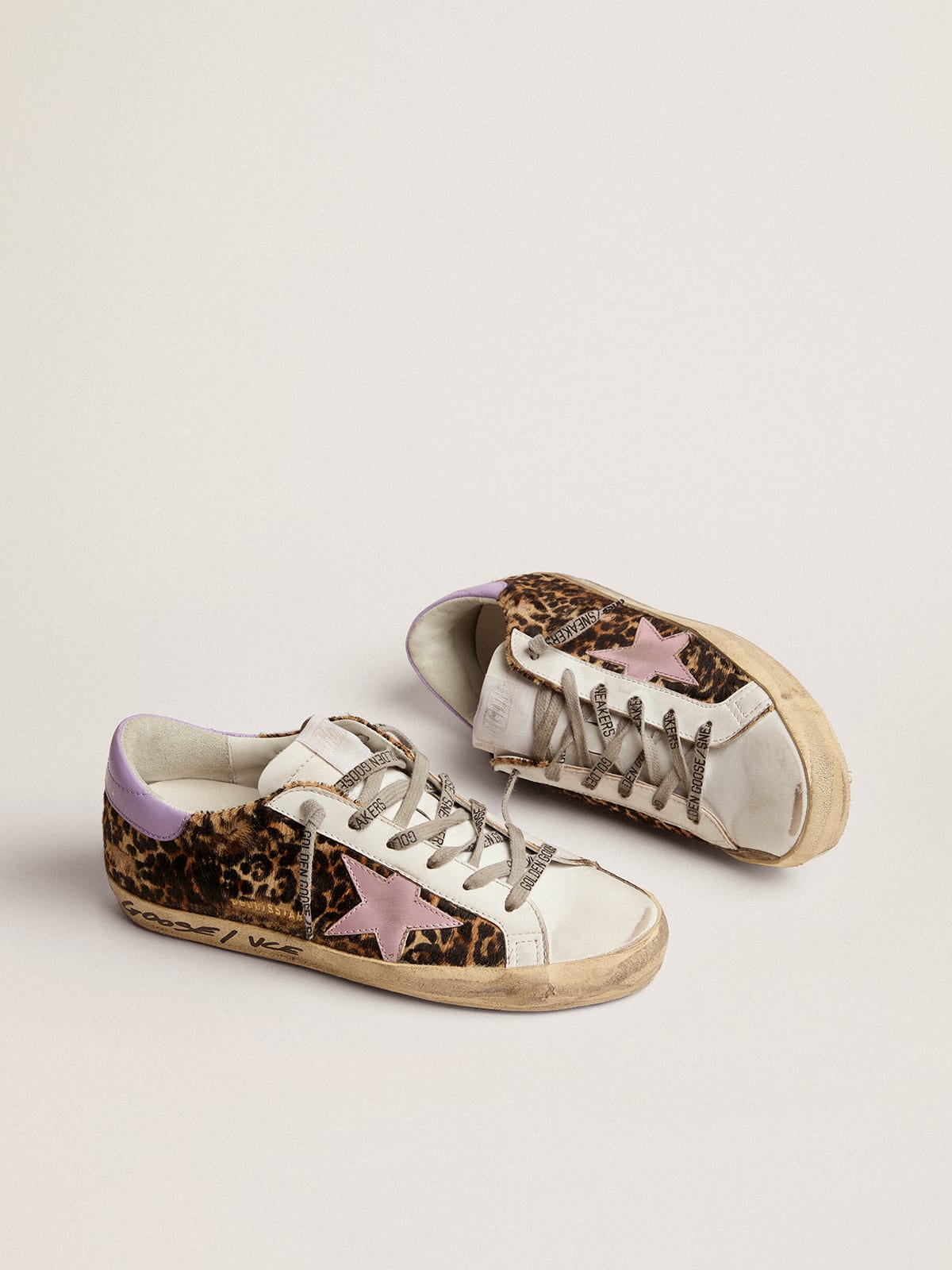 Golden Goose - Super-Star LTD sneakers in leopard-print pony skin with salmon-colored laminated leather star and purple leather heel tab in 
