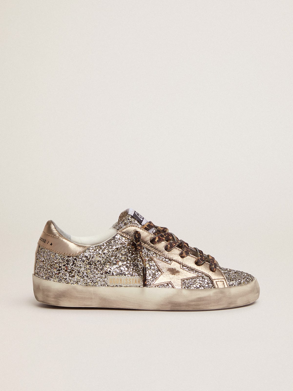 pila Grapa gráfico Super-Star sneakers in platinum-colored glitter with star and heel tab in  tone-on-tone laminated leather | Golden Goose