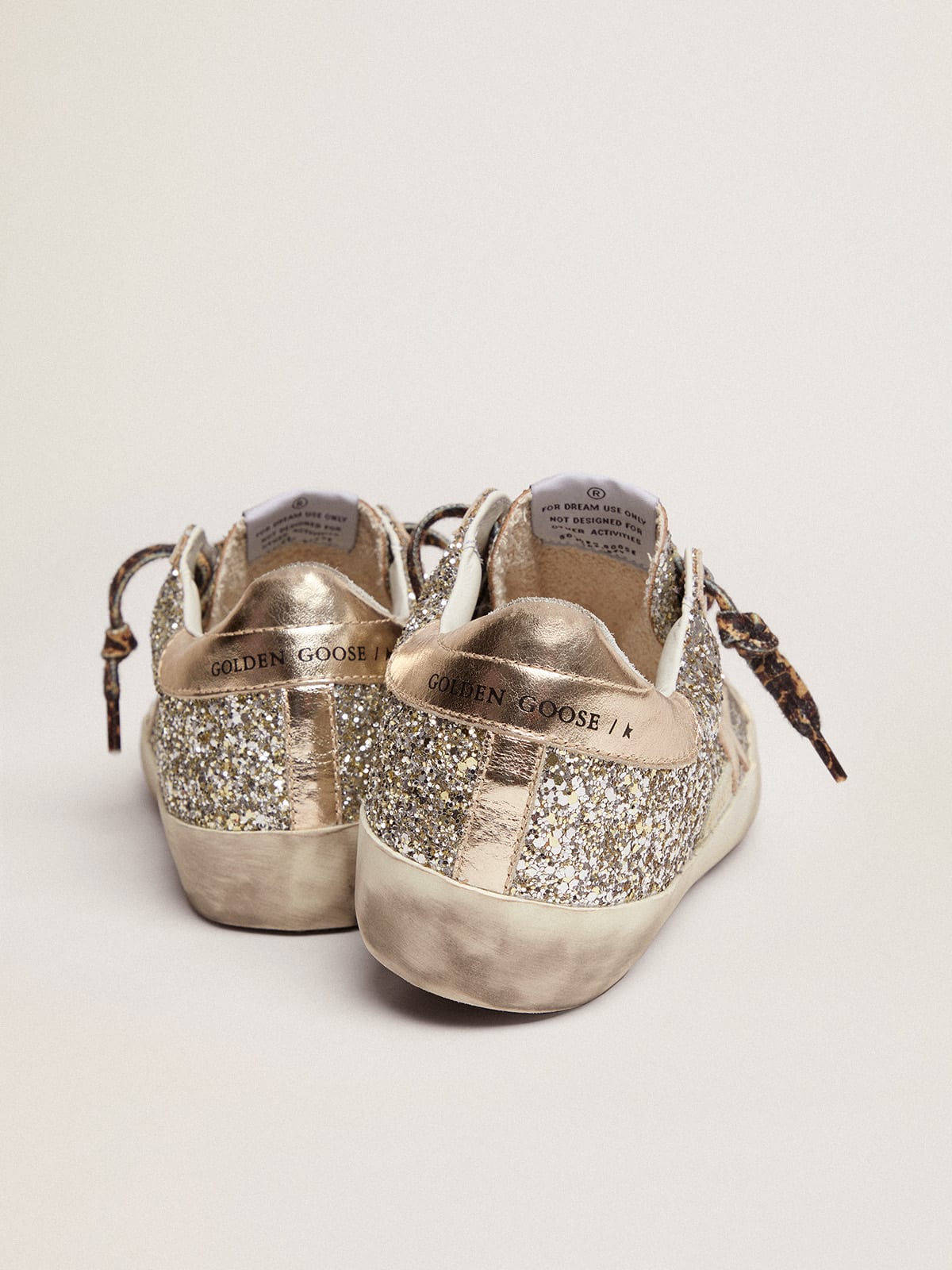 Golden Goose - Super-Star sneakers in platinum-colored glitter with star and heel tab in tone-on-tone laminated leather in 