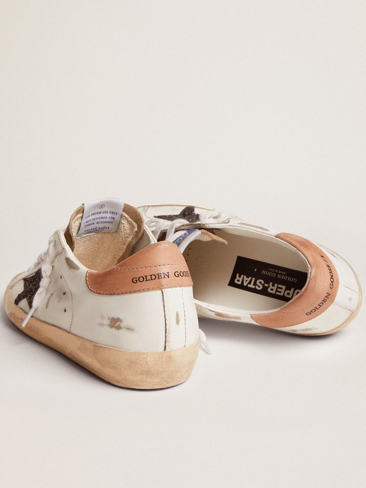 Golden Goose - Women's Super-Star with black glitter star and pink heel tab in 