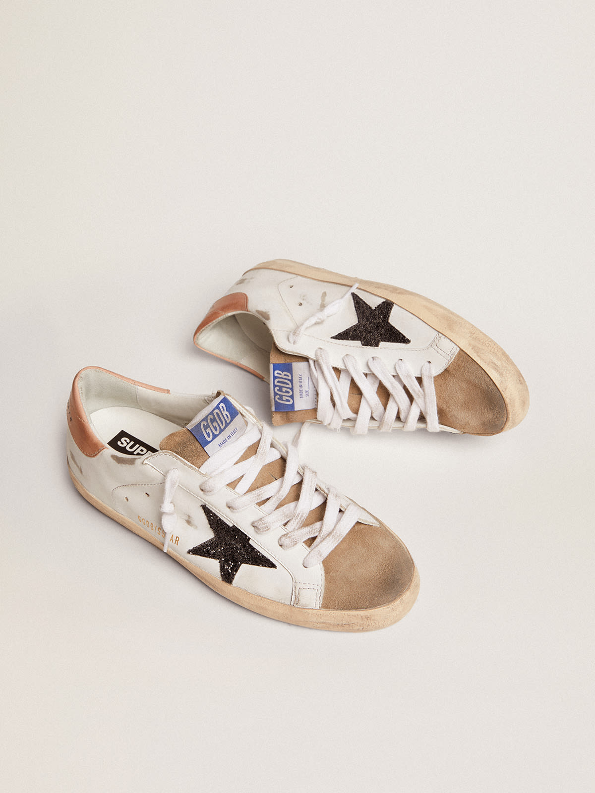 Golden Goose - Women's Super-Star with black glitter star and pink heel tab in 
