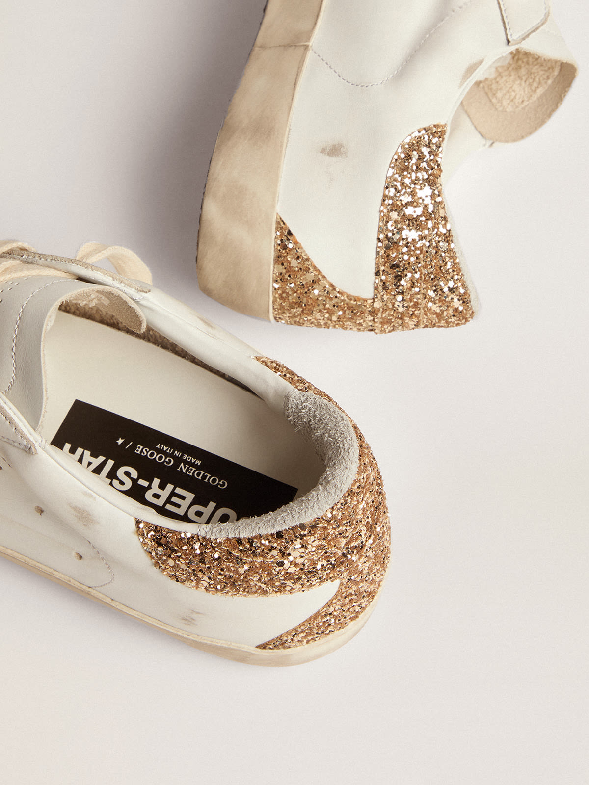 Gold glitter golden goose on sale sneakers