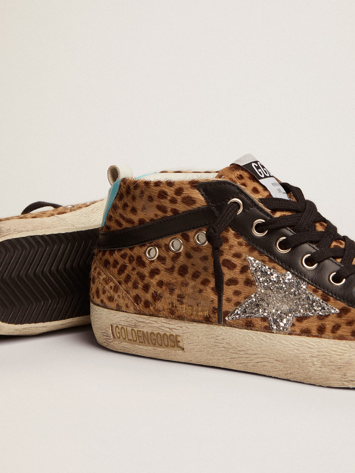 Zapatillas deportivas Star de piel efecto potro con estampado animal estrella purpurina plateada | Golden Goose