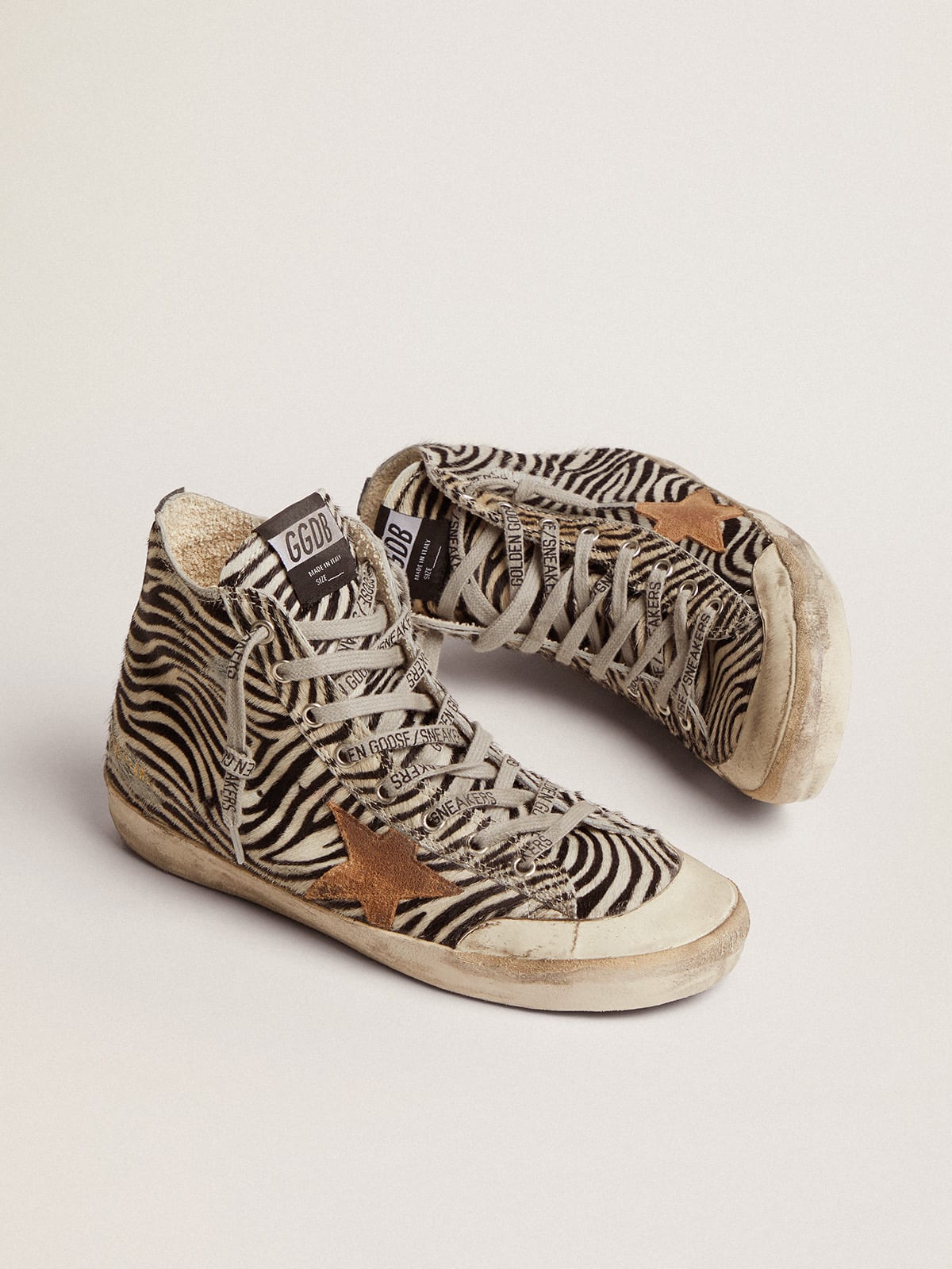 Golden Goose - Francy Penstar LTD sneakers in zebra-print pony skin with tobacco-colored suede star and black leather heel tab in 