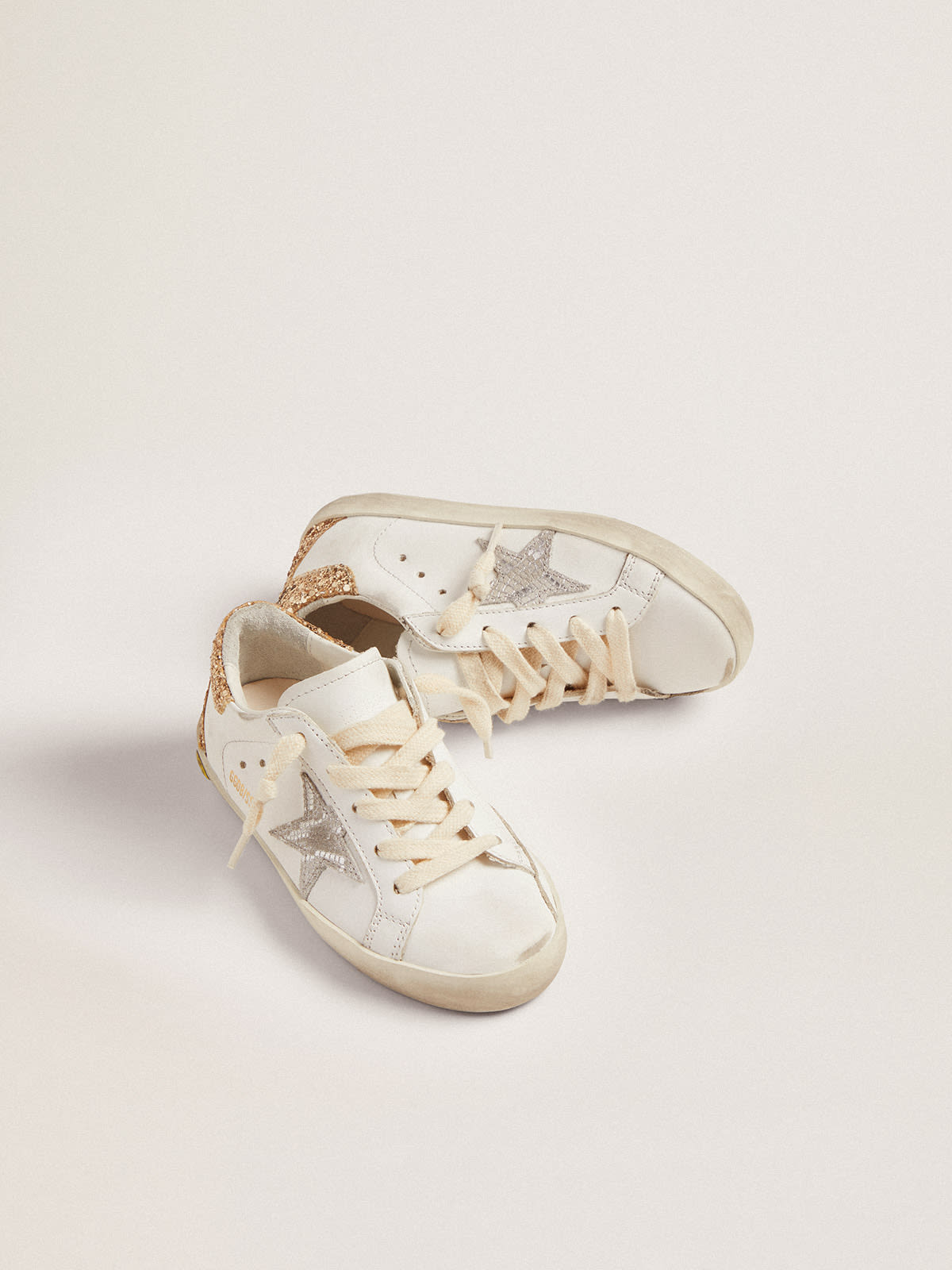 Golden goose superstar leather hotsell sneakers with metallic back