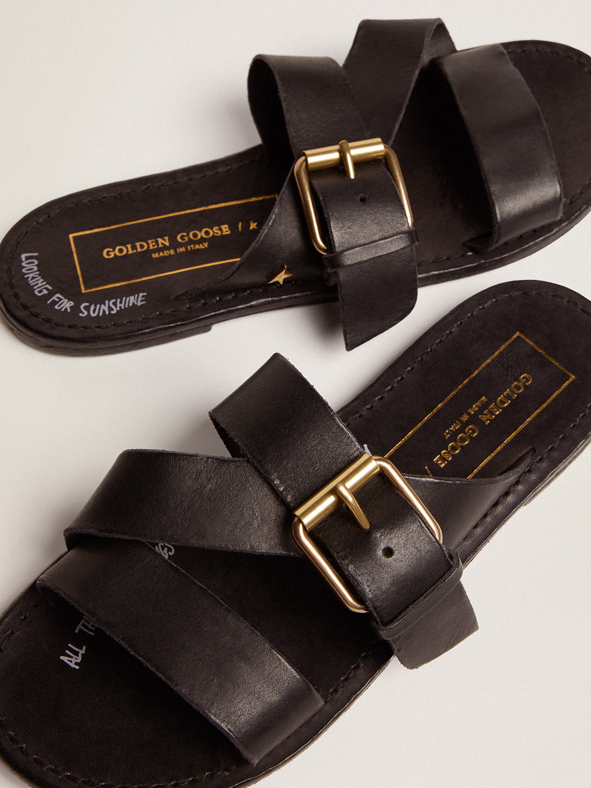Golden Goose - Margaret flat sandals in black resin-coated leather in 