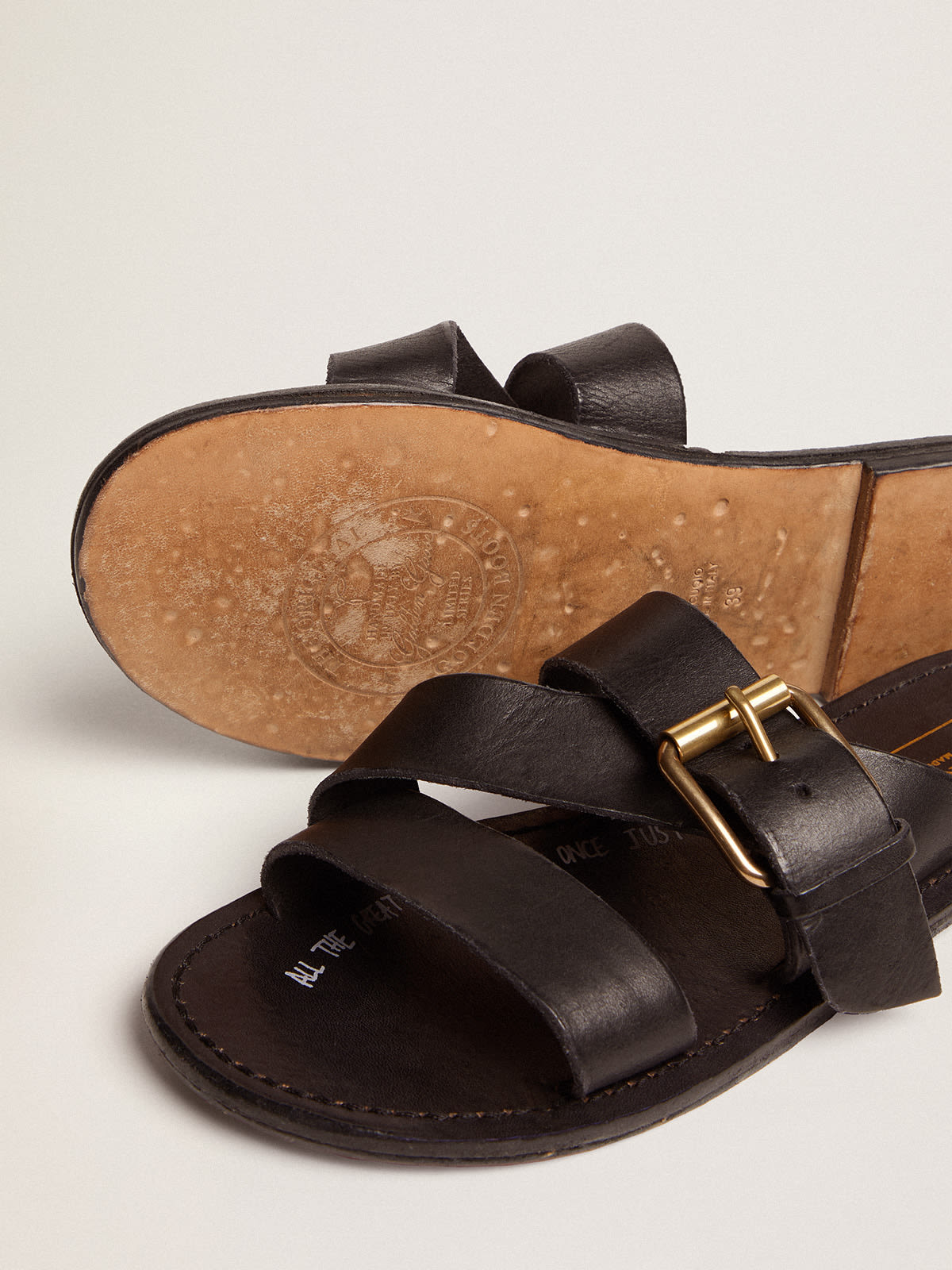 Golden Goose - Margaret flat sandals in black resin-coated leather in 