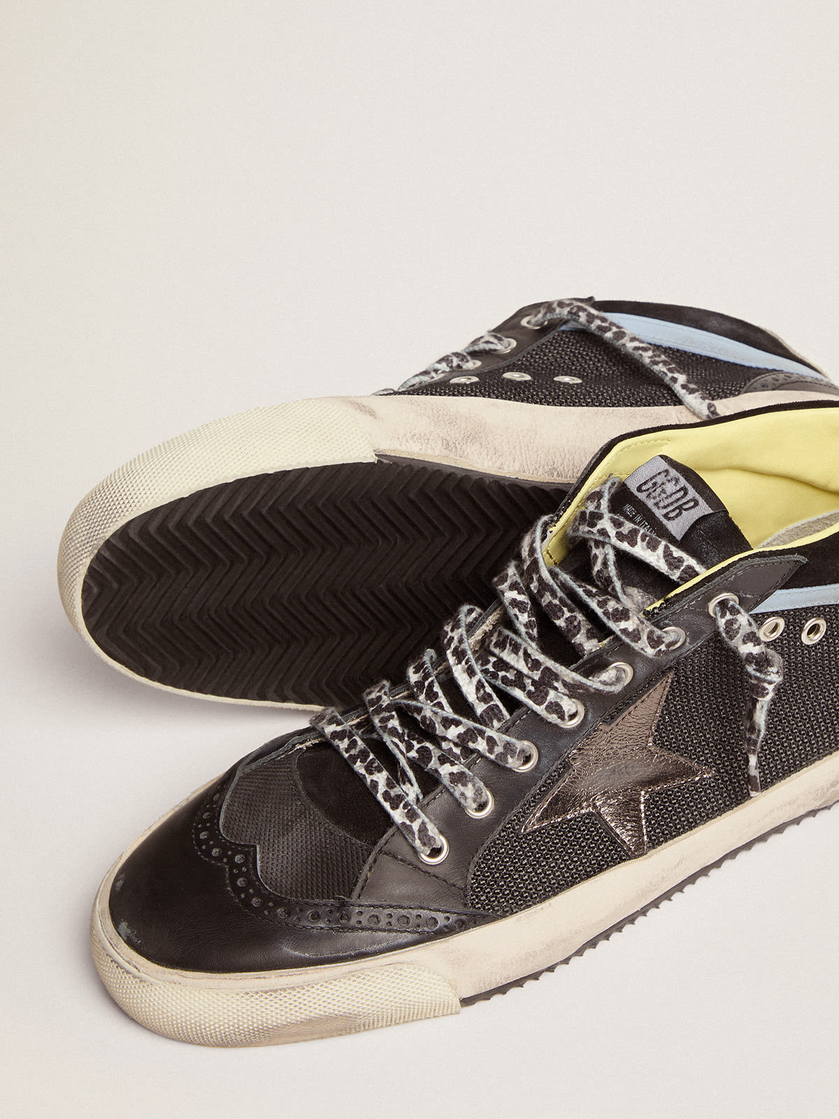 Golden Goose - Sneakers Mid Star LTD en résille et en cuir noir avec étoile en cuir lamé gris foncé in 