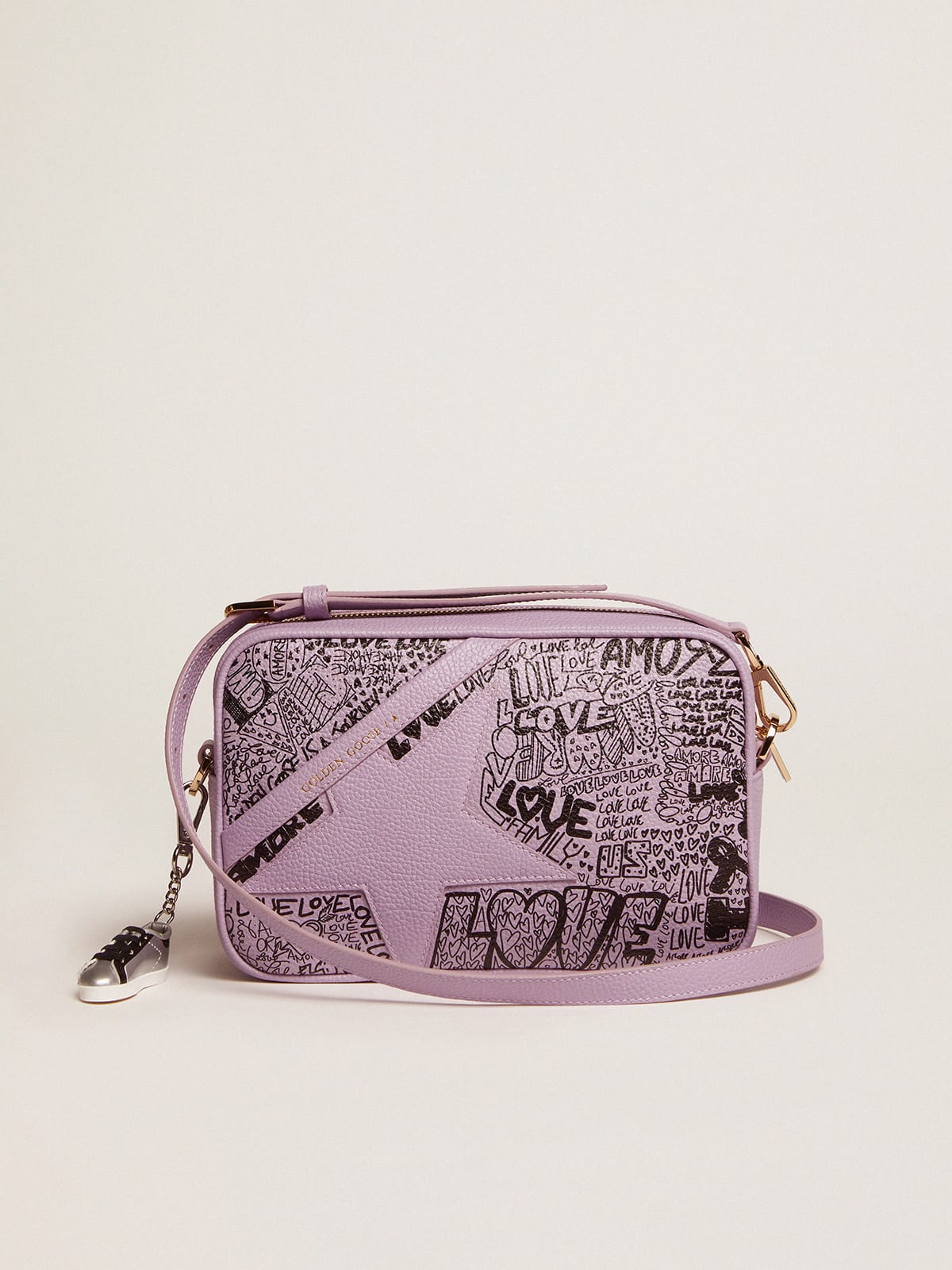 Golden Goose - Lilac hammered leather Star Bag with tone-on-tone leather star and black all-over graffiti print in 