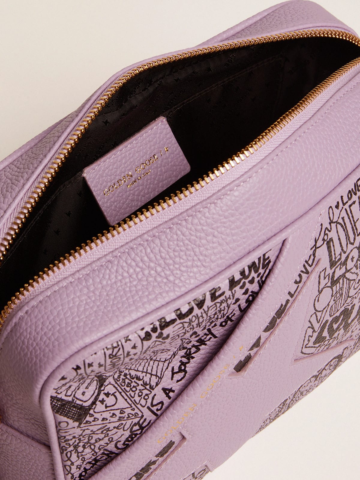 Golden Goose - Lilac hammered leather Star Bag with tone-on-tone leather star and black all-over graffiti print in 