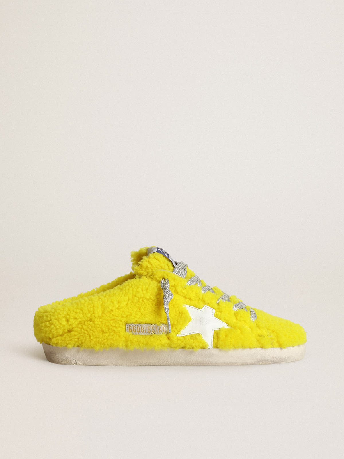 Super Star Sabots in fluorescent yellow shearling with white leather star